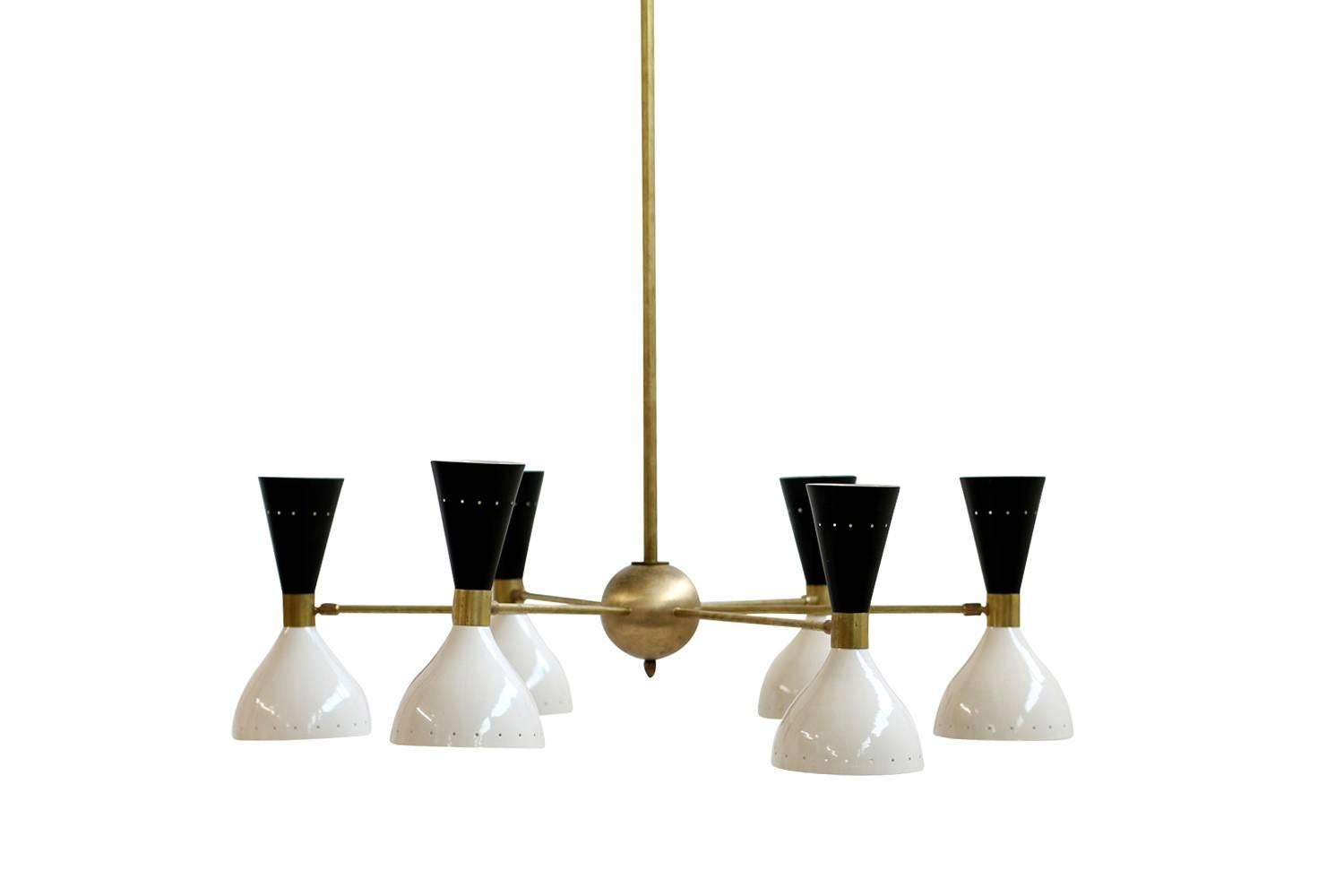 Beautiful Italian six-arm chandelier, the lampshades are adjustable and can light in different directions, every lampshade is for one large bulb and a small bulb, it can be used with both bulbs or only with one. Beautiful design and beautiful light.