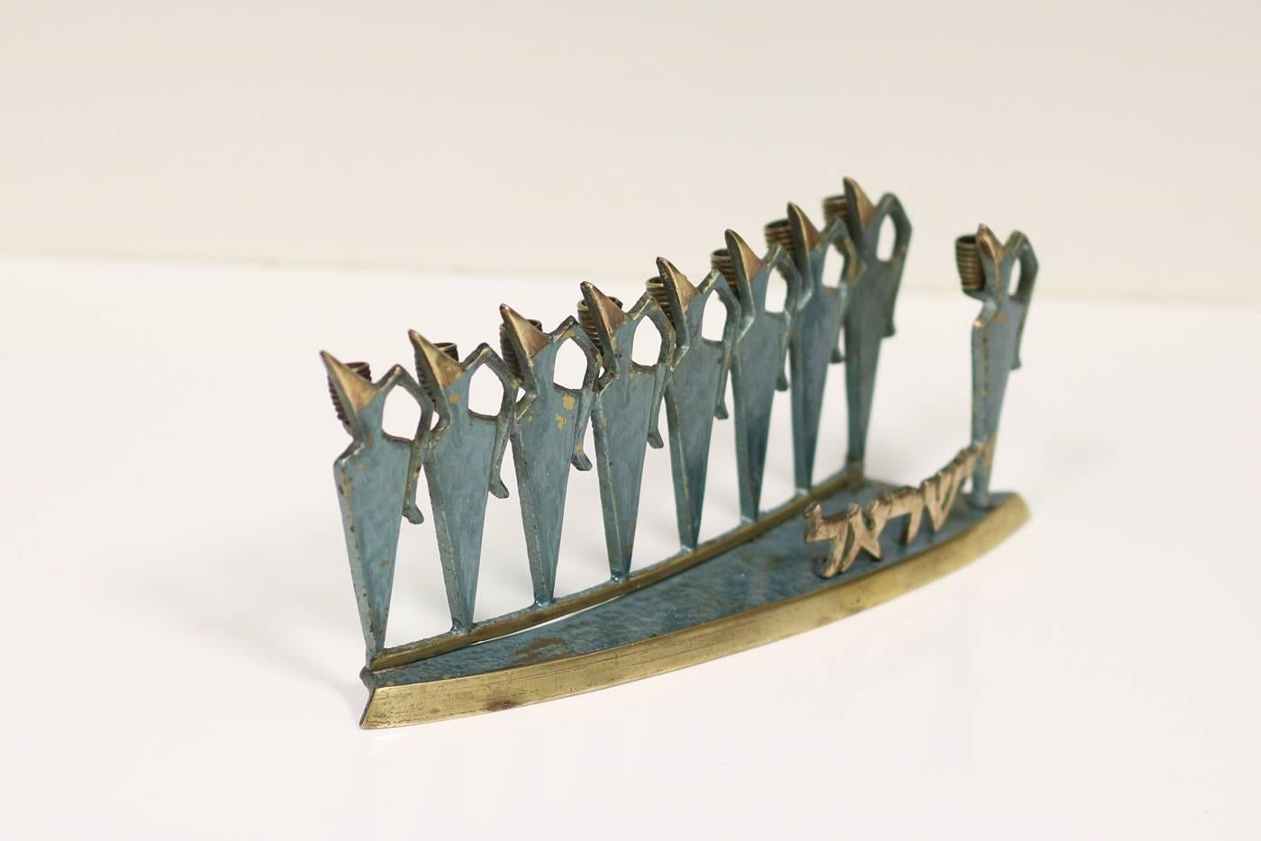 Beautiful 1950s handcrafted metal sculpture, candleholder, brass, made in Israel. Hanukkah Menorah, Judaica. Good, authentic vintage condition.
Insured free shipping worldwide!