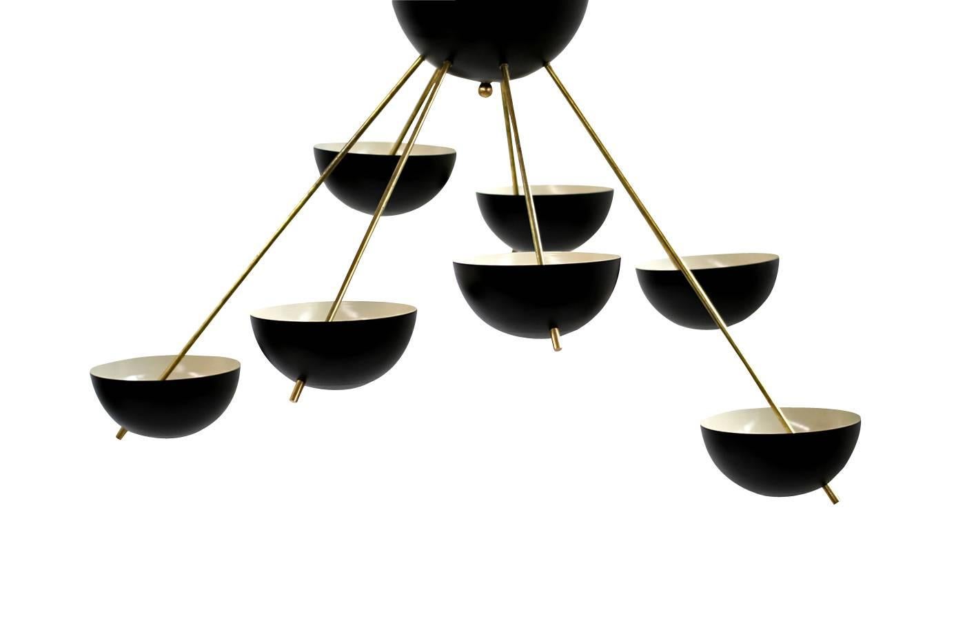 Amazing Italian brass and metal flush mount chandelier with seven bowl shaped shades, for one big bulb up to 75W each. Beautiful patina on the brass parts, the metal parts are lacquered in black, the chandelier has been already rewired. Overall a