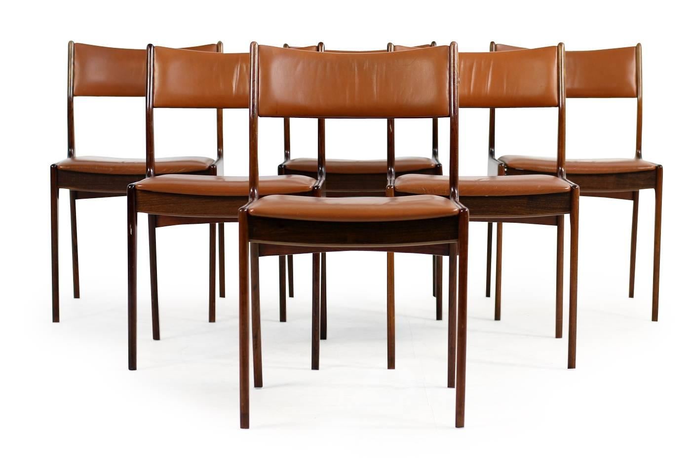 Beautiful set of six Danish modern design dining chairs by Johannes Andersen for Uldum, Denmark. Good vintage condition, fantastic patina on the leather, other dining chairs and matching dining table available, please check our 1stdibs storefront.