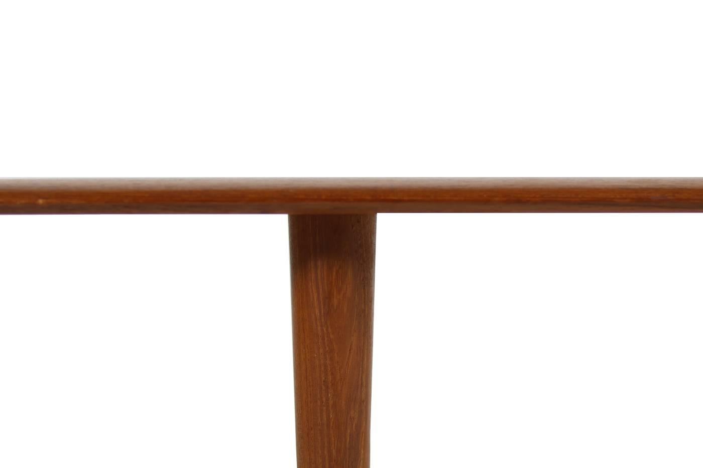 Beautiful Minimalist teak coffee table by Peter Hvidt & Orla Mølgaard Nielsen for France & Son, Denmark. Very good condition, marked underneath. We have also another Hvidt coffee table with cane and teak, please check our 1stdibs storefront.