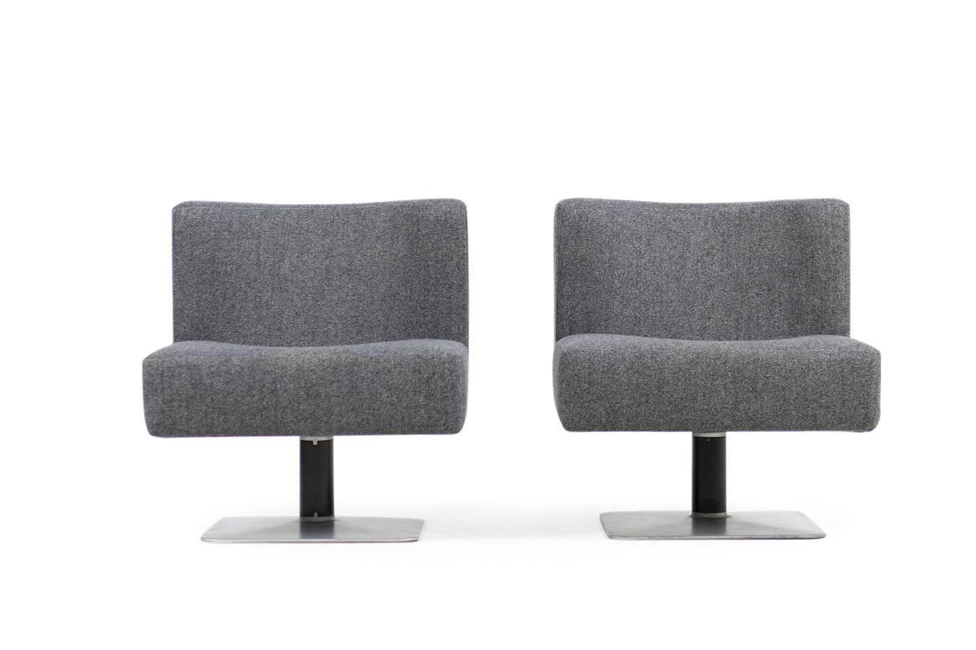 Beautiful pair of 1970s Herbert Hirche model 350 modular lounge chairs, made by Mauser Werke, circa 1974/1975
New upholstery and covered with grey wool woven fabric, metal and iron base, beautiful form and design. Each chair ca. W 69cm x D 67cm x H
