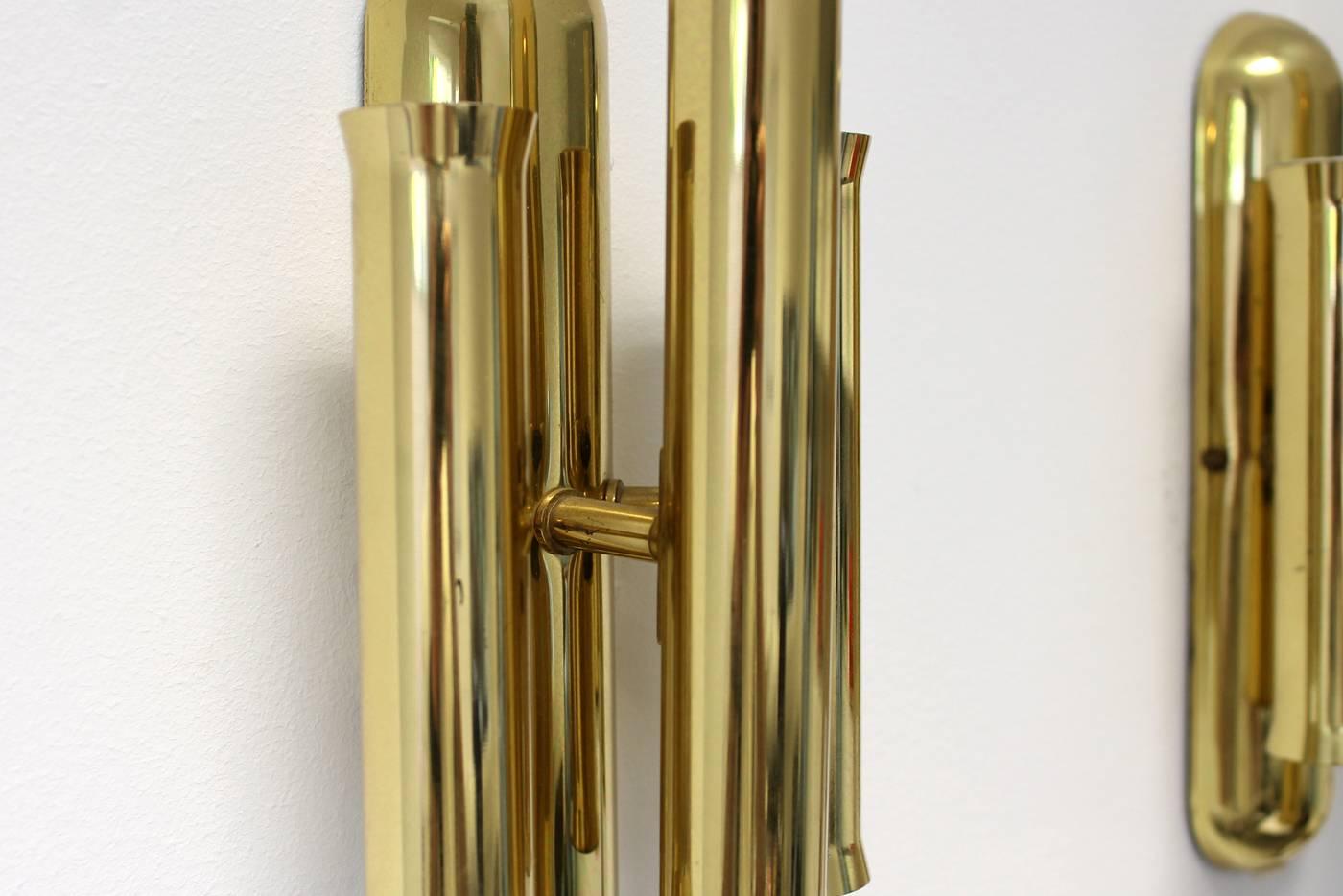 Beautiful set of two brass sconces, Italy, 1960s. Each lamp for six small bulbs (not included) very good condition. Attributed to Arredoluce, Stilnovo, Gio Ponti. Free shipping worldwide.