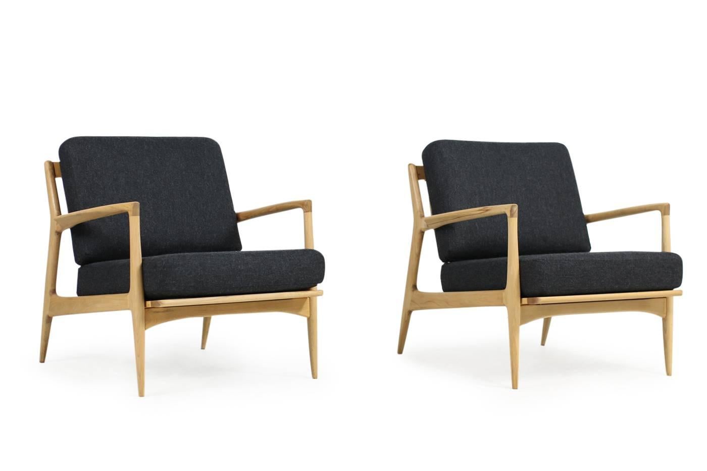 Beautiful set of two matching, organic 1960s easy chairs, designed by Ib Kofod Larsen, beechwood, new upholstery and new high quality wool woven fabric (very dark grey, almost black) fantastic condition, beautiful form and design.