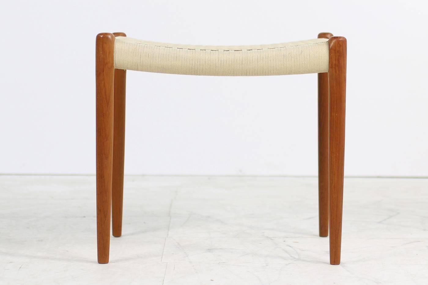 Beautiful and rare Niels O. Moller teak stool, model 80A for J.L. Moller, Denmark. Fantastic Danish Modern design, great condition. The seat is made of flat woven cord of wool string. (The matching armchair, mod. 66 is also available, please visit