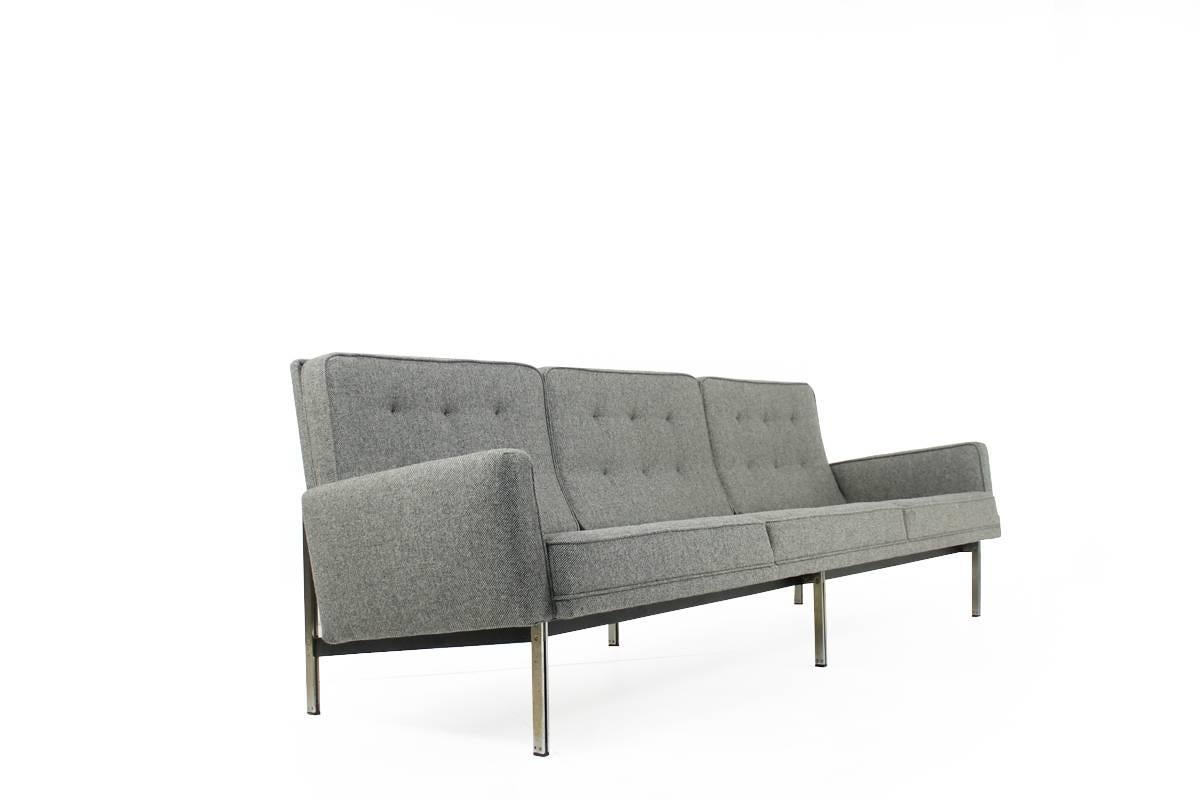 Beautiful Florence Knoll sofa Mod. 57 parallel bar sofa from 1959 for Knoll International. Very good condition, slightly patina on the steel frames, new upholstery and covered with new and beautiful high quality wool fabric. Matching armchair and a