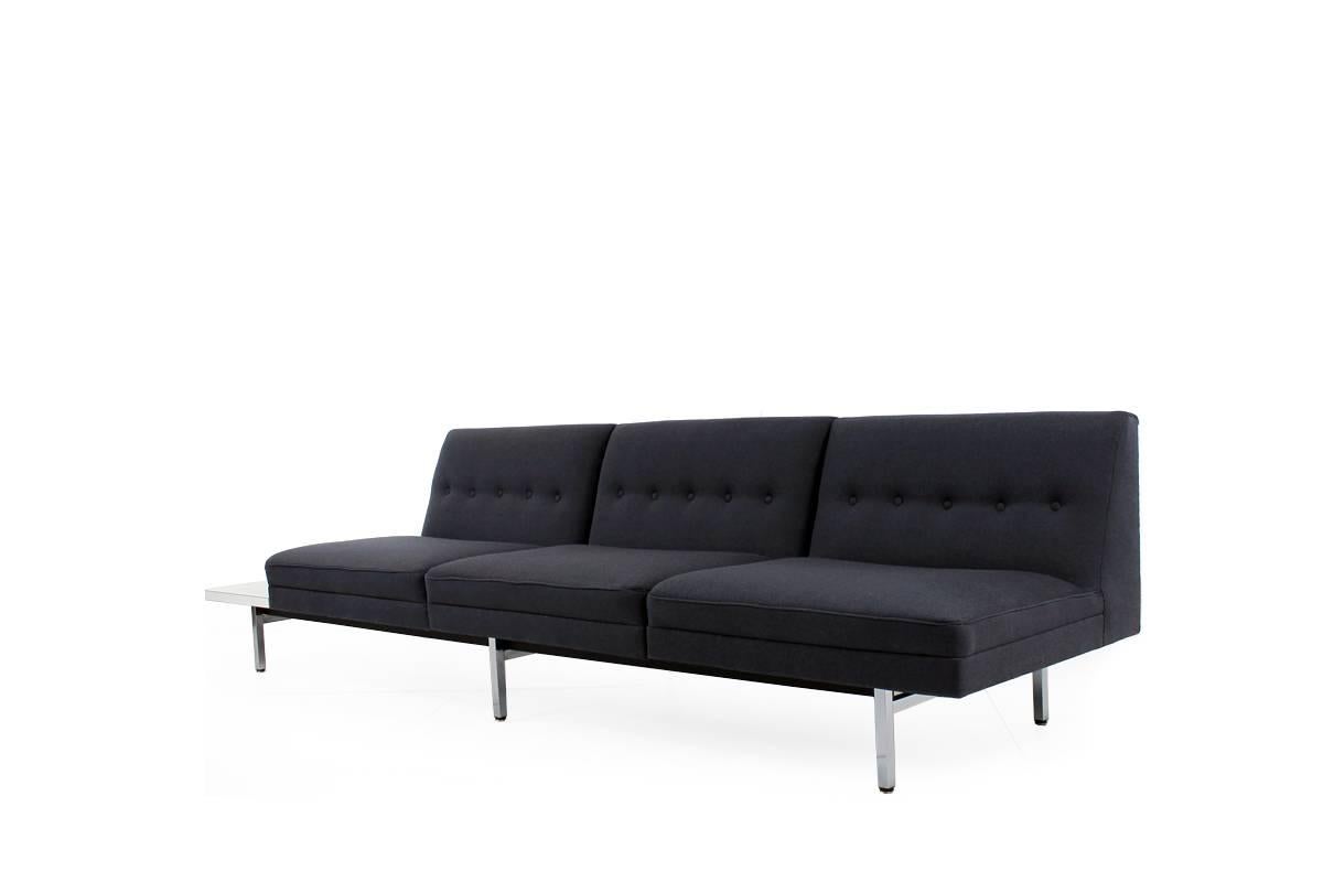 Beautiful George Nelson modular sofa for Herman Miller, the seats were reupholstered and covered with new fabric in graphite grey. Base with slight patina, seats and table can be mounted at different positions. Matching George Nelson 2-seater Sofa,