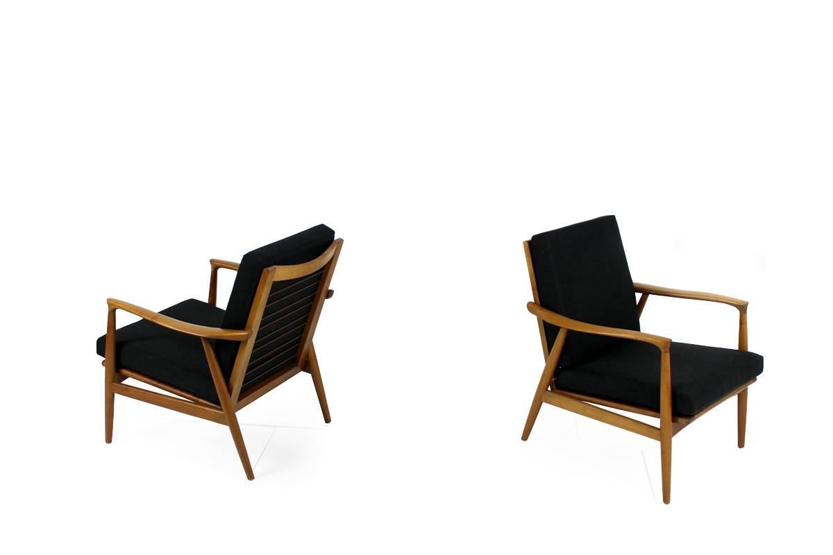 Fabric Pair of beautiful scandinavian Mid Century sculptural walnut Easy Chairs 1960s