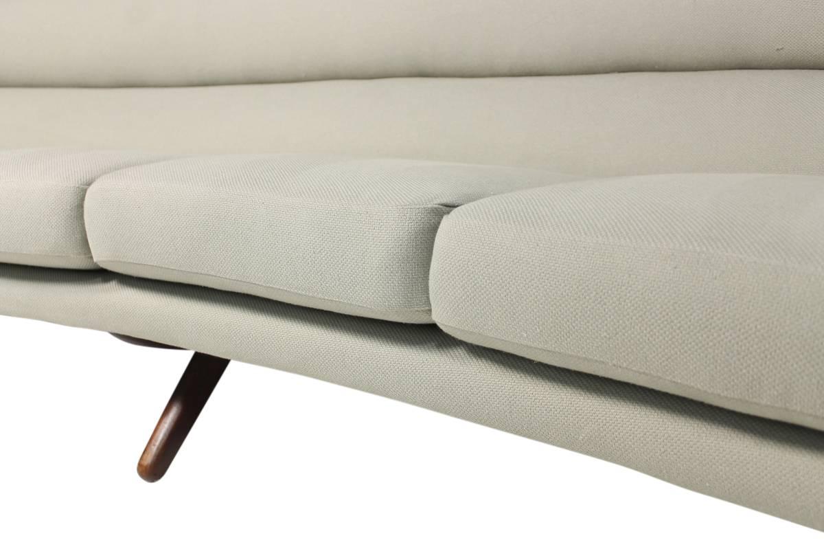 Beautiful and very rare Danish modern curved four-seat sofa from 1968 on solid teak base - it was restored, the innerspring cushions and the base were newly upholstered and covered with soft, woven grey fabric. Very good condition, beautiful piece.