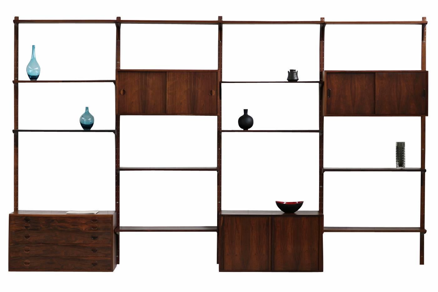 Beautiful, large and very rare Rud Thygesen & Johnny Sorensen for HG Mobler Denmar, modular shelf system. It can be arranged as desired, very high quality furniture, was manufactured in a small edition or to order. 
The 2 large cabinets are ca.