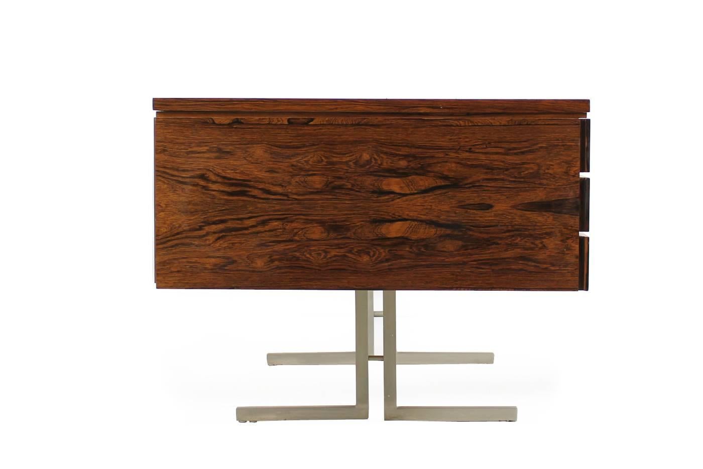 Beautiful desk, rosewood and metal, maple wood inside, fantastic condition and a very minimalistic form and design. freestanding, both keys. Beautiful piece.