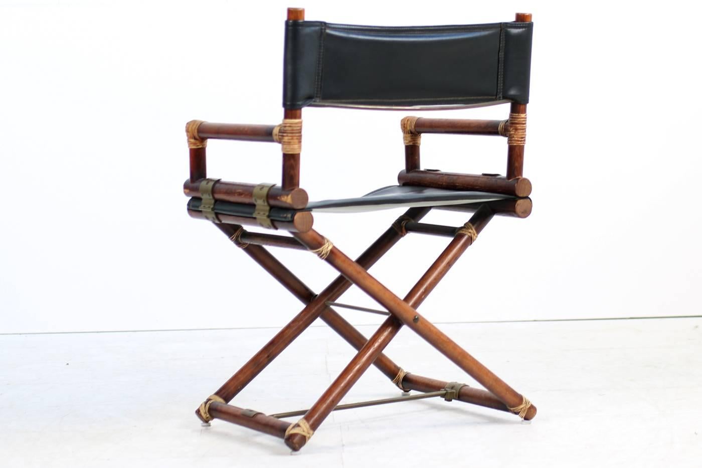 Fantastic Director's folding chair, bamboo, oak, black leather and brass, it's the early edition with brass parts. Hans Kaufeld license, purchased in the 1950s
Great condition, wood, leather and brass with beautiful patina, folding mechanism works