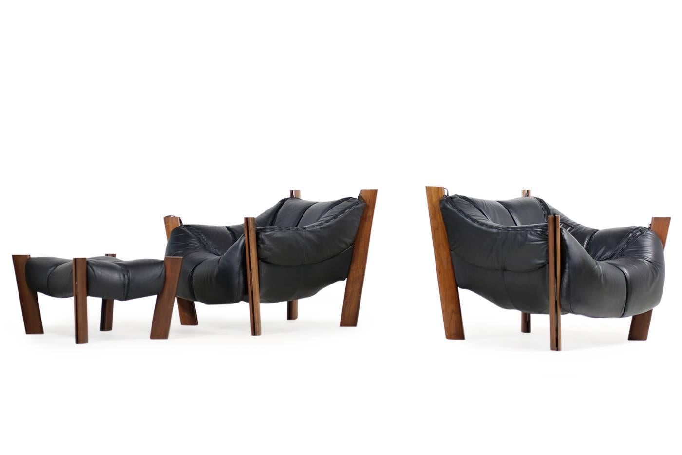 Beautiful vintage lounge chairs with ottoman by Percival Lafer, designed in 1974 in Brazil, solid wooden jacaranda base and leather. 
We also offer the matching lounge sofa.

Measures: sofa 220 x 93 x 74cm sh 38cm
chairs 95 x 93 x 74cm sh