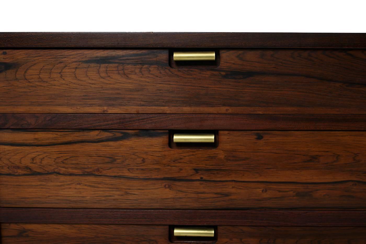 Super rare and beautiful Danish modern design chest of six drawers in a very good condition. Unique model in authentic condition, from the 1960s. Beautiful shades of the rosewood, solid drawers, fantastic condition, never saw this model before,