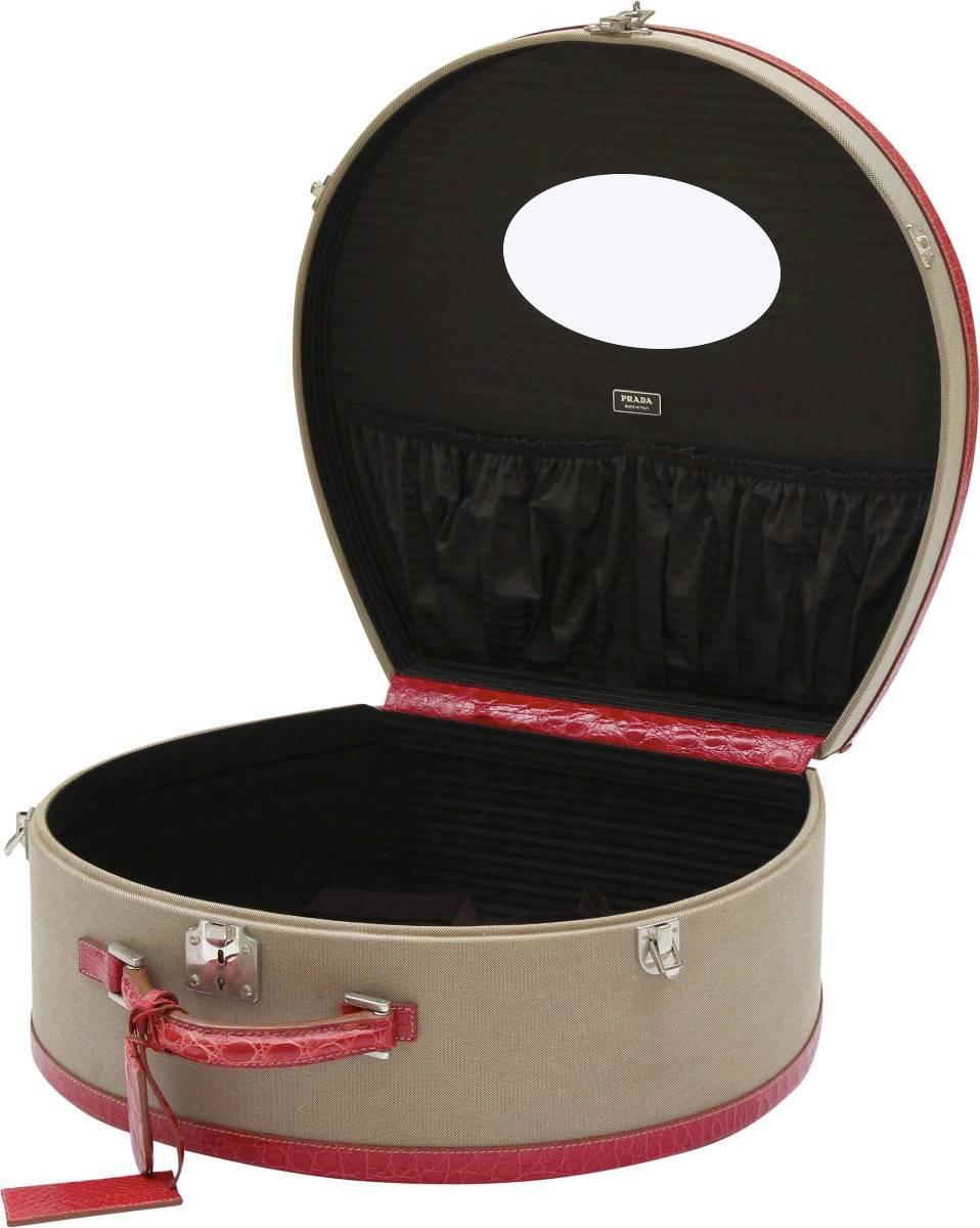 An exceptionally rare piece from the house of Prada, this vintage inspired hat trunk is a stylish and sophisticated way to dress up your boudoir or as a stylish travel piece.