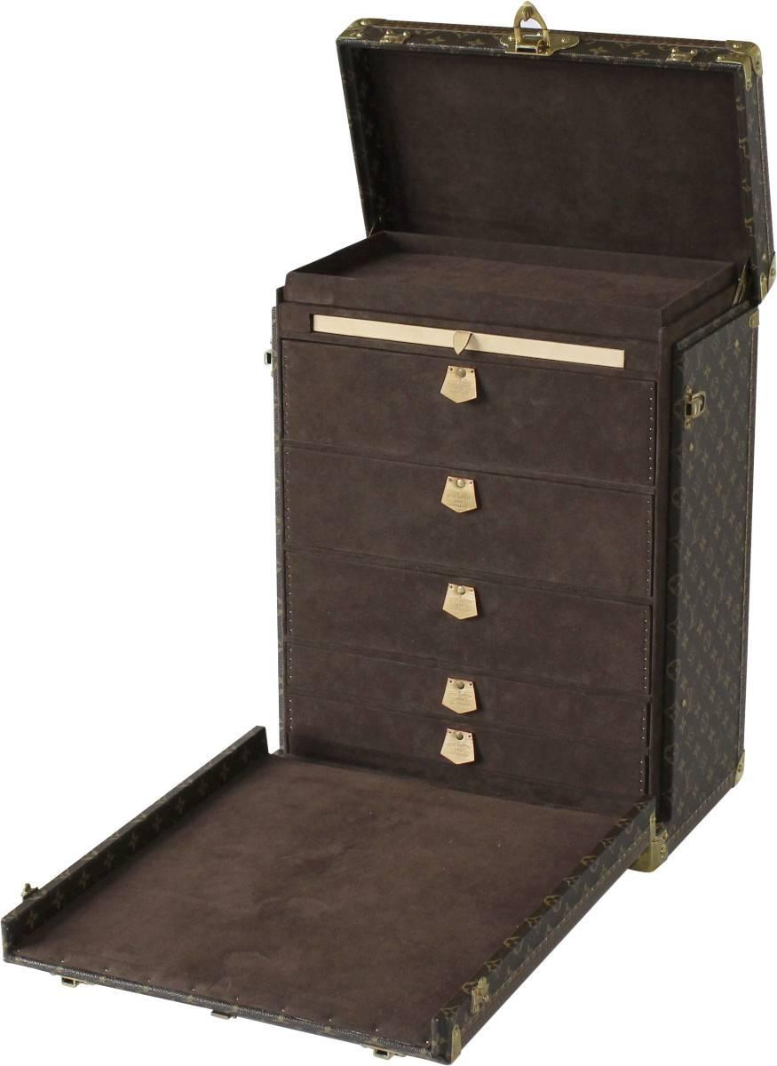 A custom-made jewelry and watch trunk from Paris. Sourced from the Champs-Élysées store as a one of a kind order. For someone with a exquisite jewelry and watch collection this is the perfect way to display and store your items. This trunk opens