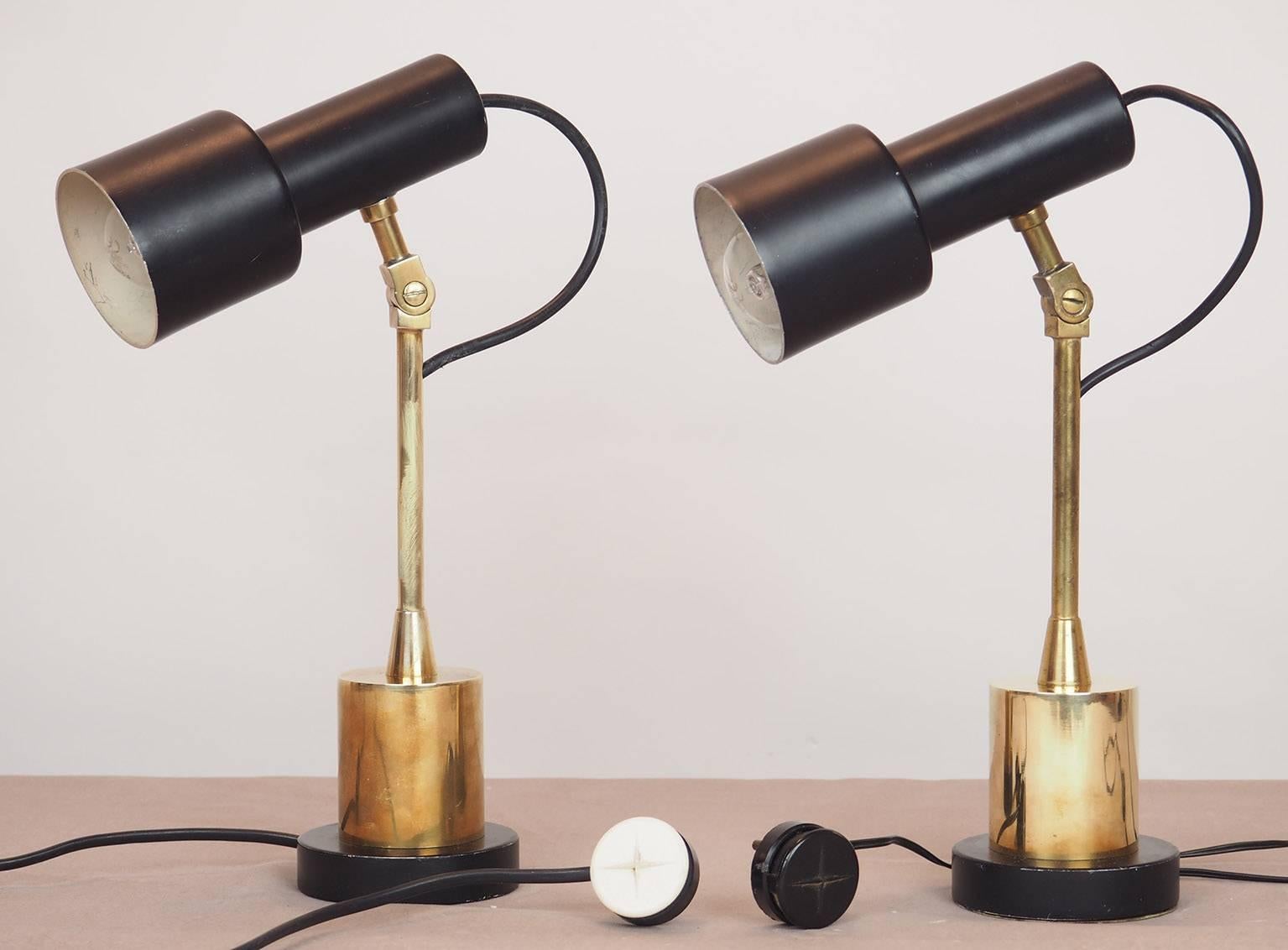 Pair of  nice  and original table lamps by Stilnovo, in very good original vintage condition with beautiful brass basement and black lacquered metal adjustable reflector.
Nice also on the night-tables of your bedroom.
Original nice patina.
  