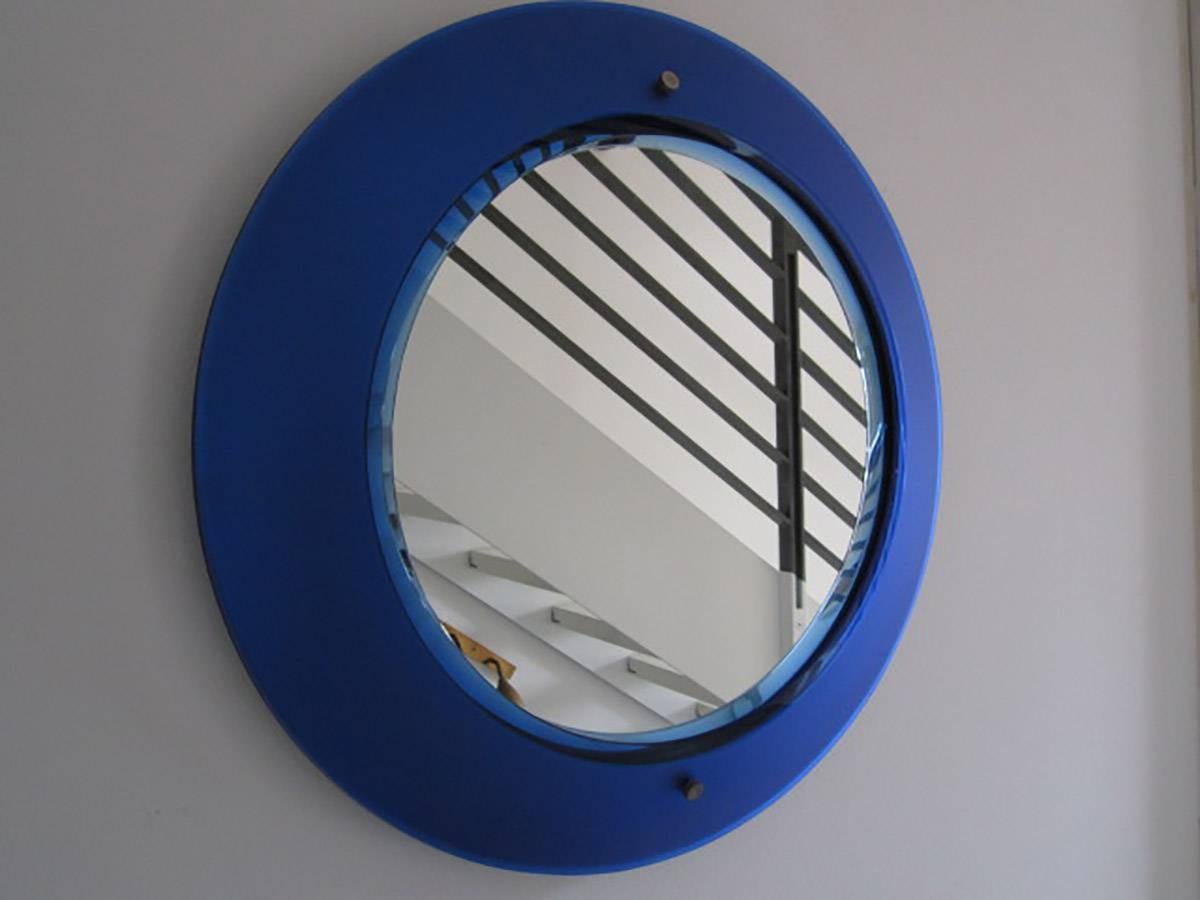 Rare Fontana Arte blue mirror.
Convex blue mirrored frosted glass.
Perfect original condition
Bibl.: Specchi e Specchiere.