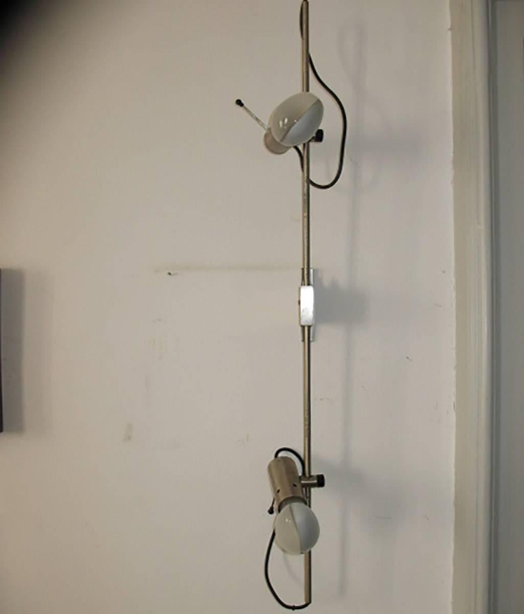 Very rare version of the Tito Agnoli wall lamp with two adjustable reflectors
Original patina and working with Cornalux bulb light.
Edited by Oluce in Milano.

 