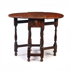 Small Early 18th Century Elm Gate Leg Table