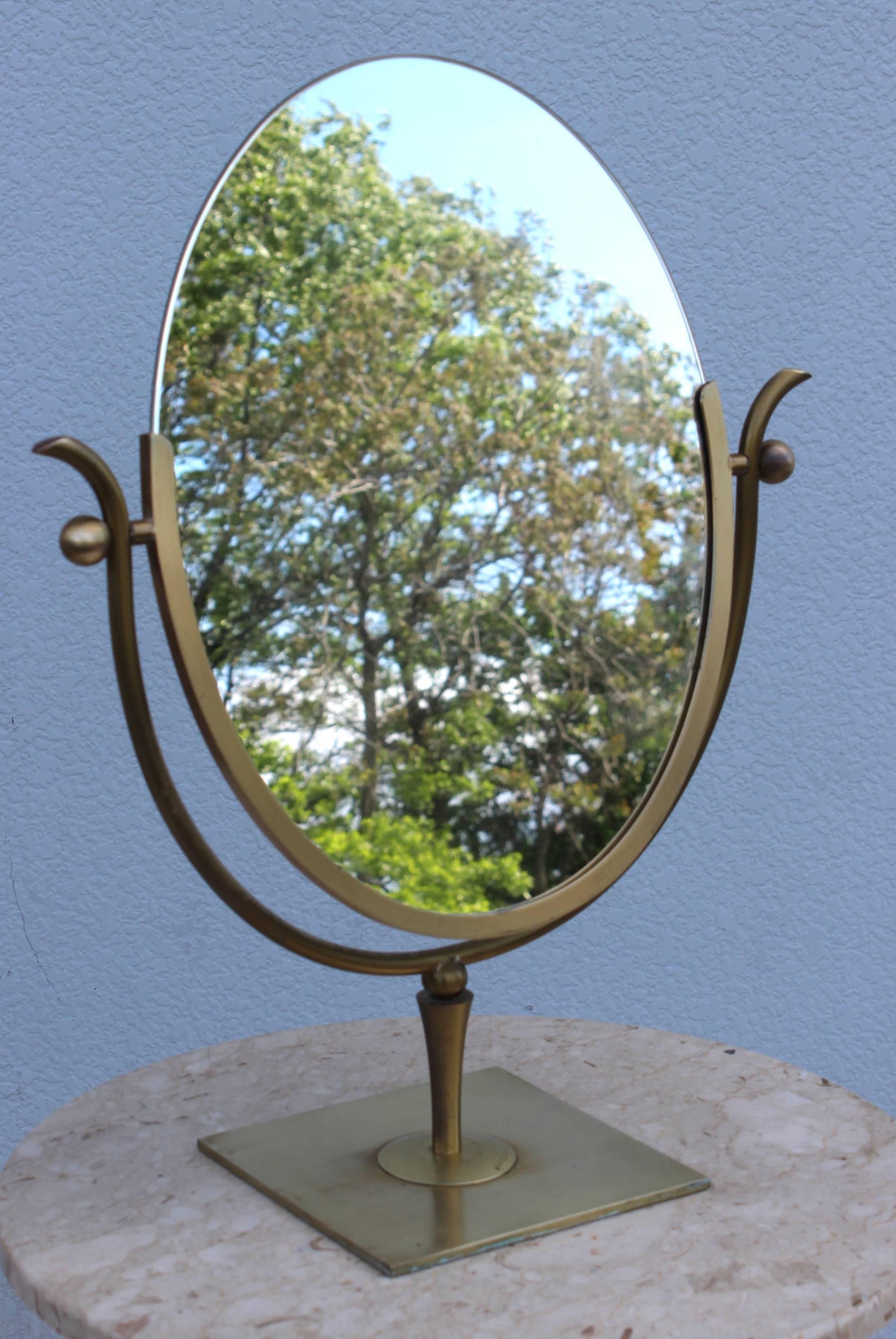 Stunning large 1950s double-sided brass vanity mirror by Charles Hollis Jones.