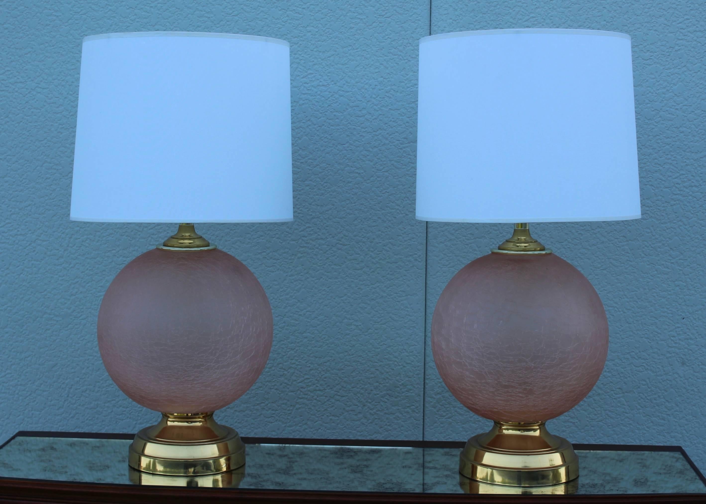 Large pair of 1970s crackled glass table lamps with brass hardware.

Height to light socket 22