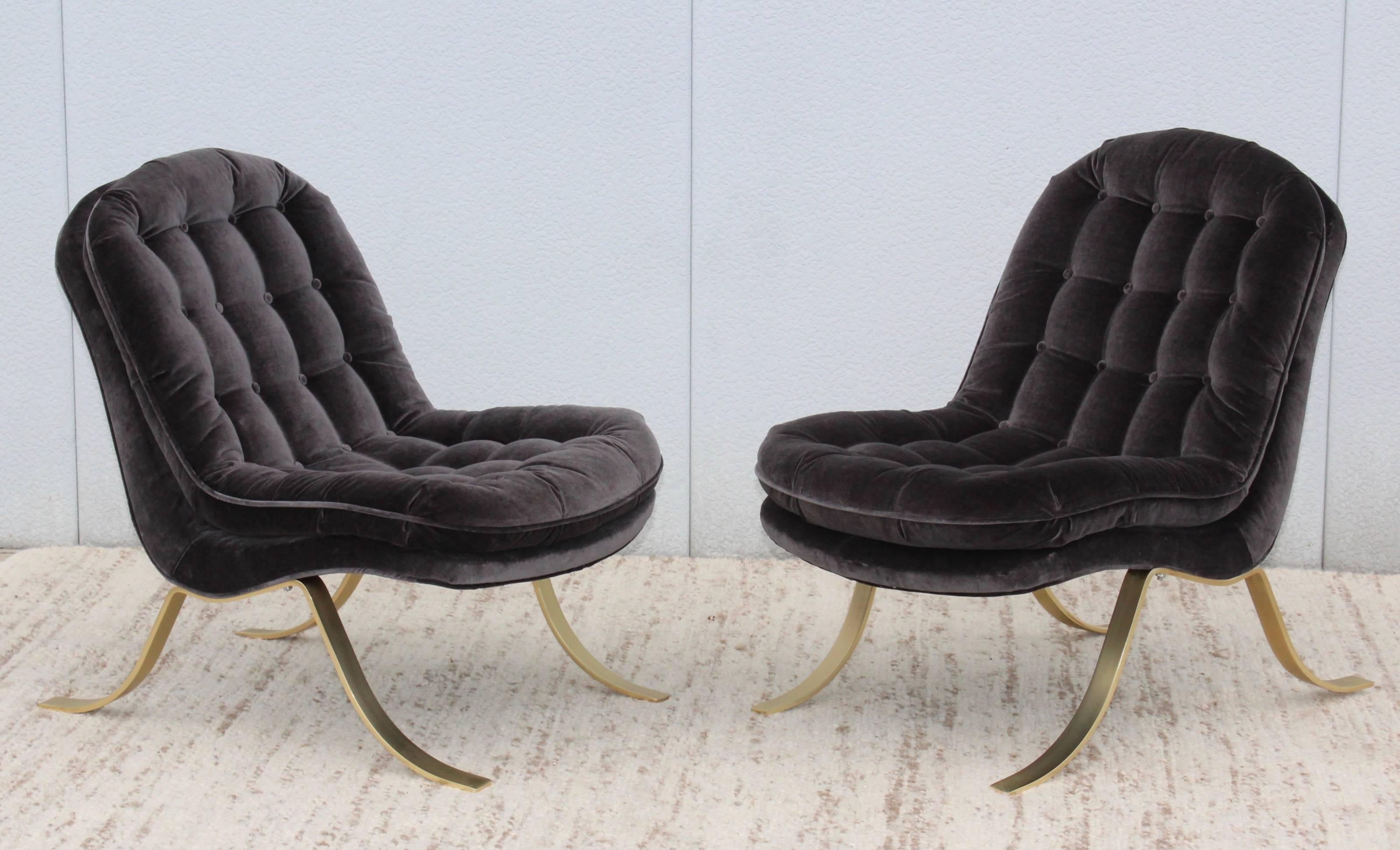 1960s modern Italian slipper chairs. With steel base and brass finish. New velvet upholstery.
