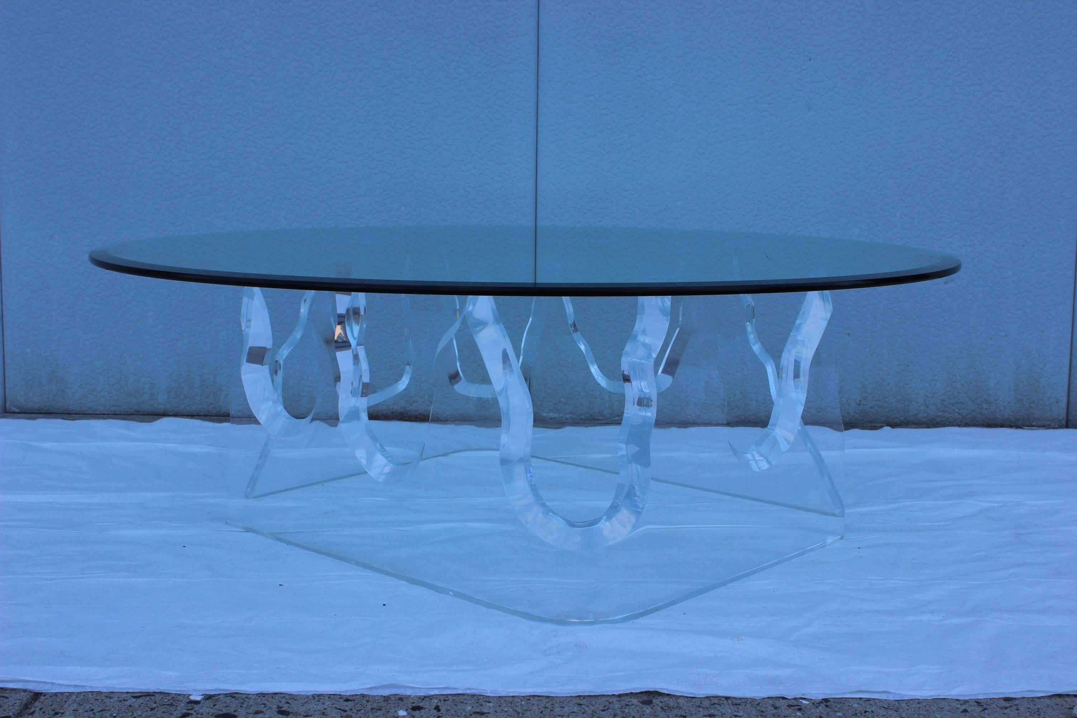 1970s modern large sculptural Lucite base with 48'' glass top coffee table, in the style of Lion in Frost.
