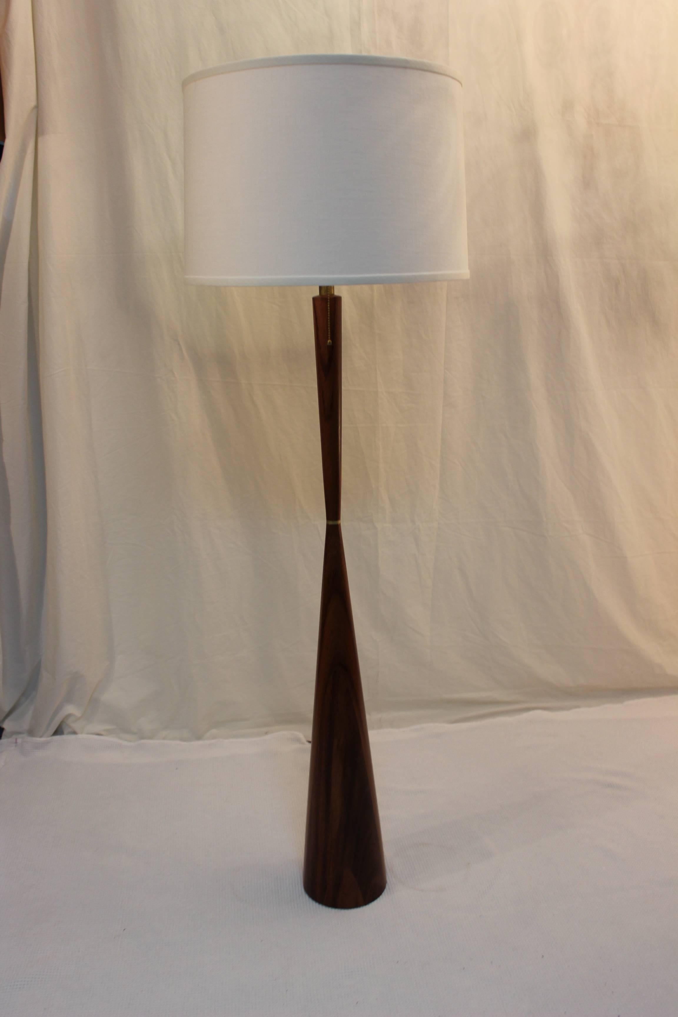 Stunning 1960's modern Phillip Lloyd Powell style conical walnut floor lamp.

Height to light socket 48.5''

Shade for photography only.