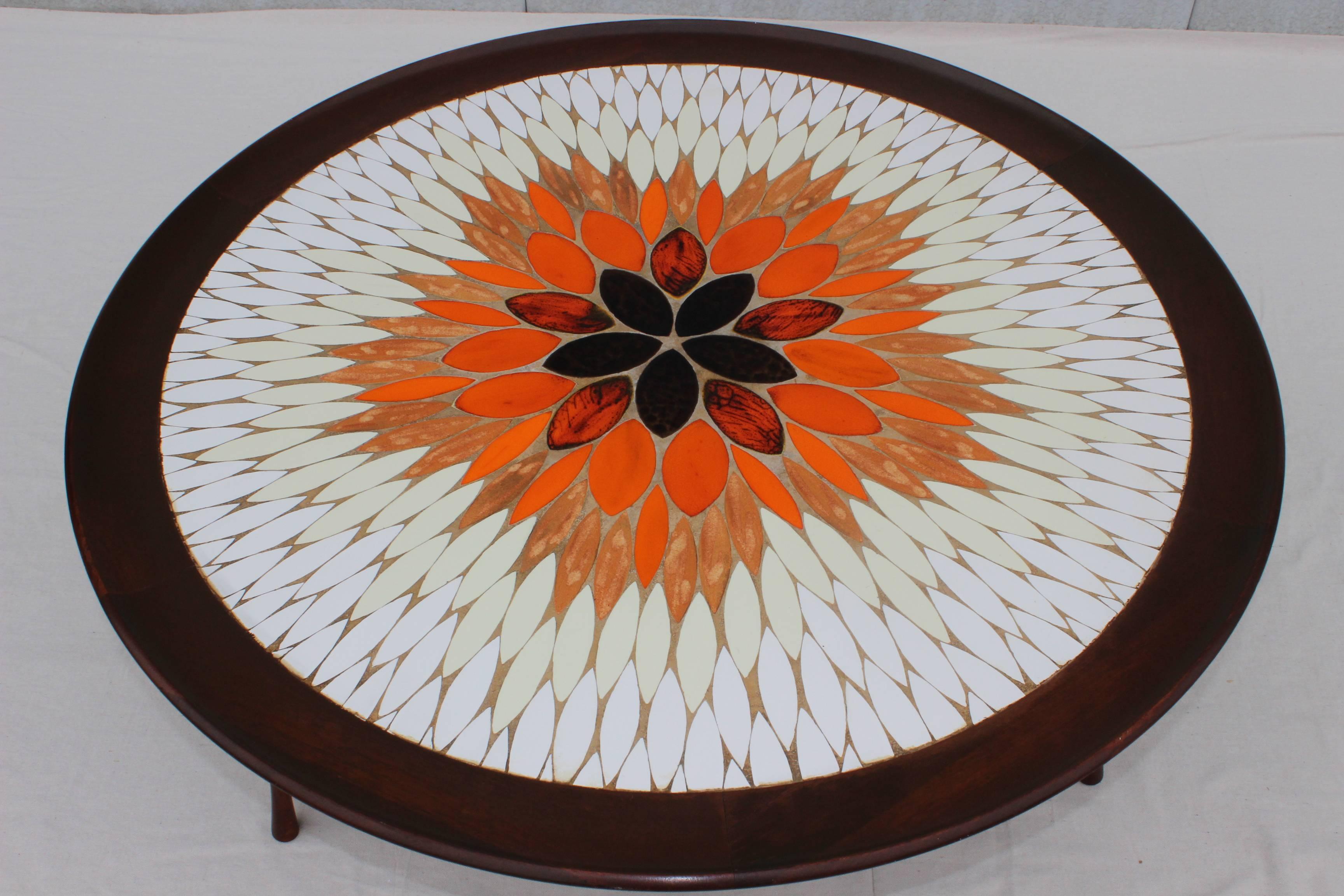 1960s modern Italian mosaic tile and walnut coffee table, with sculptural solid walnut screw on legs.