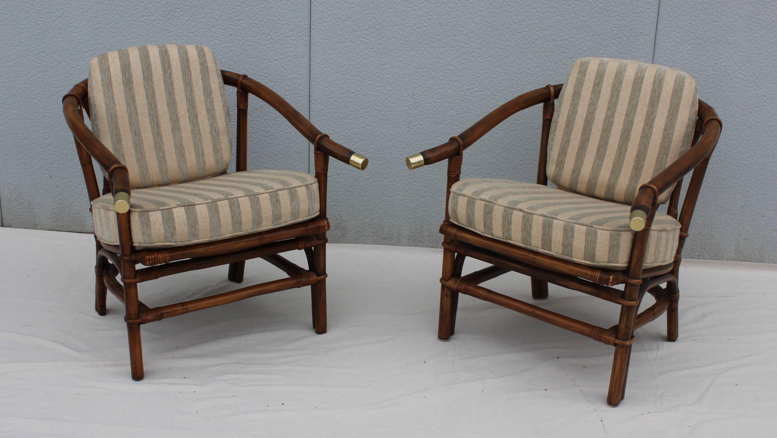 1950s Ficks Reed rattan and bamboo armchairs with chenille upholstery.


