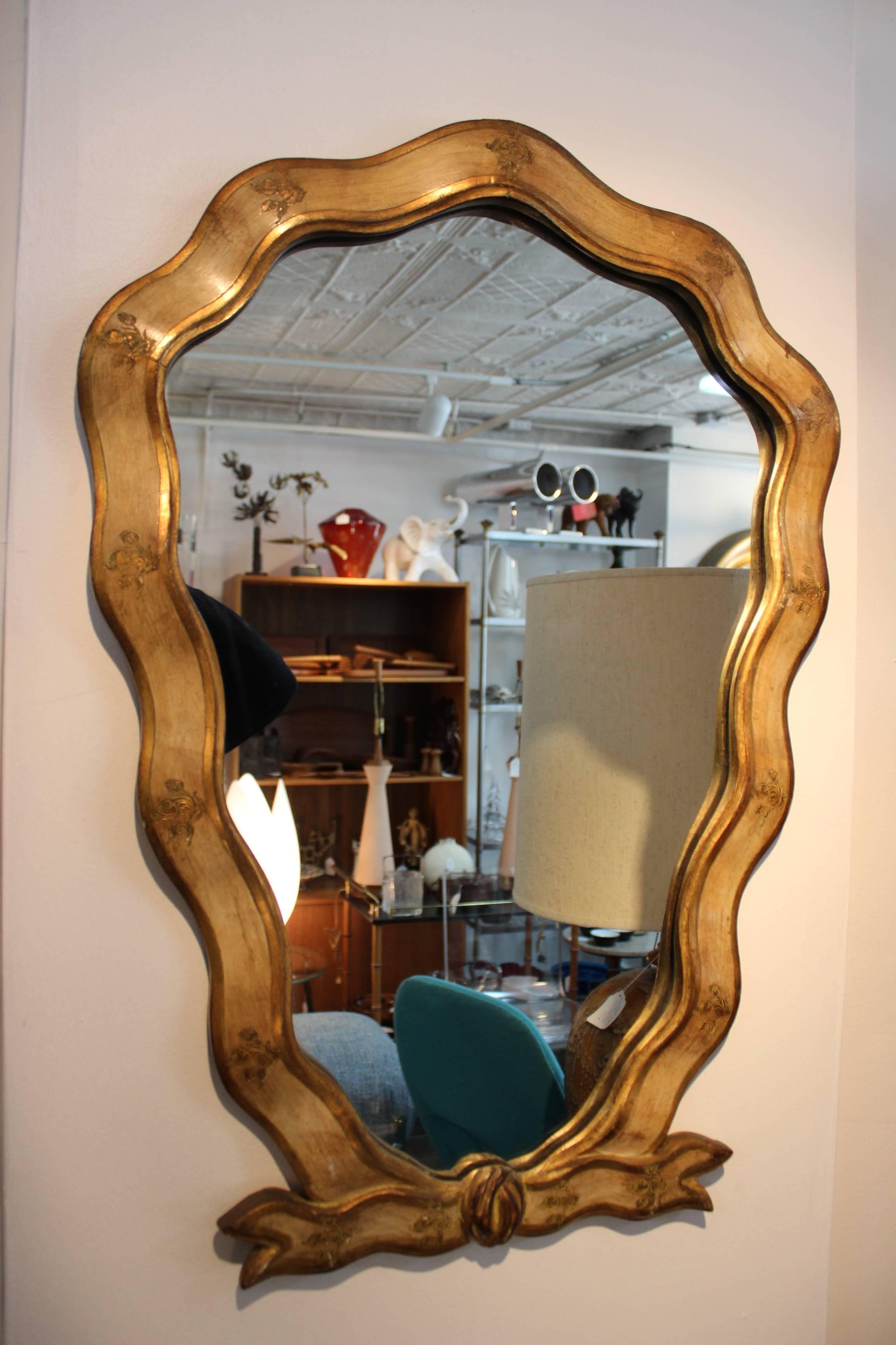 1940s wood frame Italian mirror with matching console.

Console measurements:
height 25''.
depth 12''.
width 23.5.