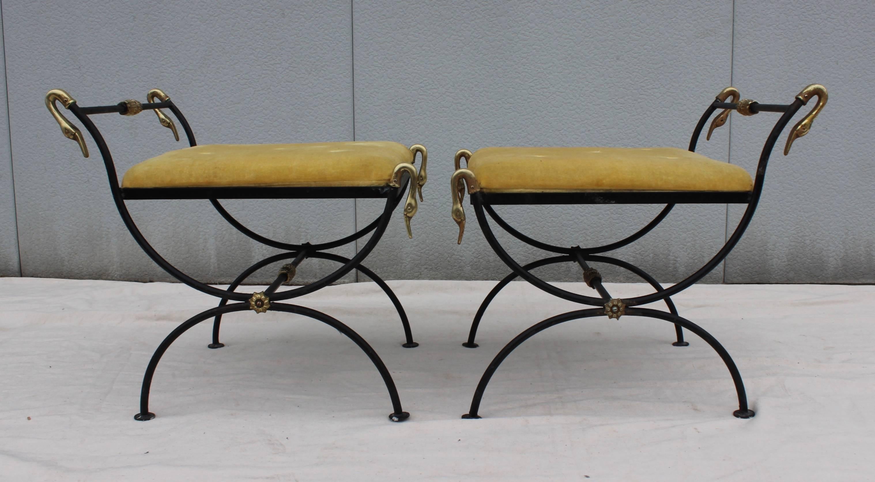 1940s French swan brass and iron with Curule bases ottomans.

 