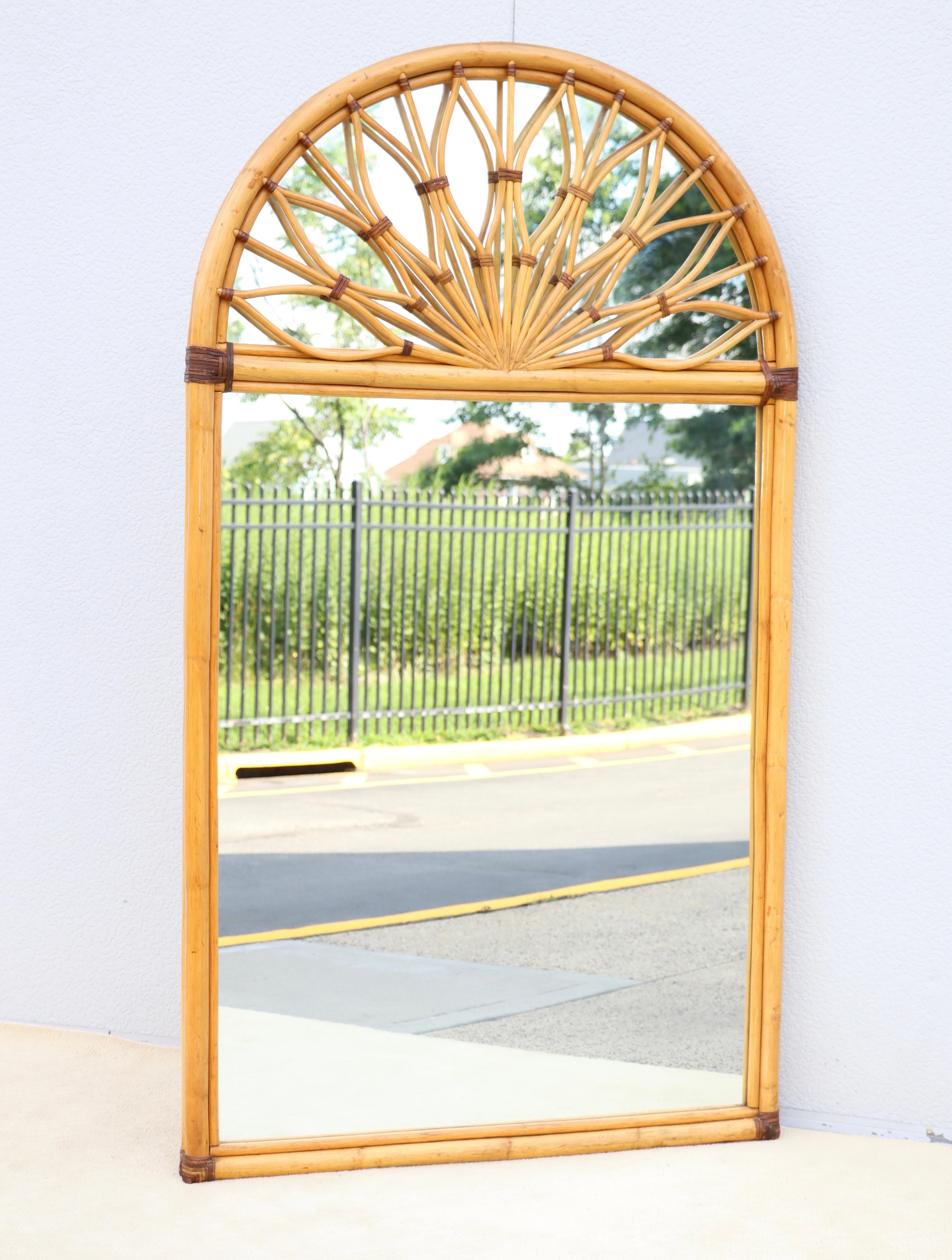 Beautiful large oversized wall or floor dome top rattan and bamboo mirror, in vintage original condition with minor wear and patina due to age and use.