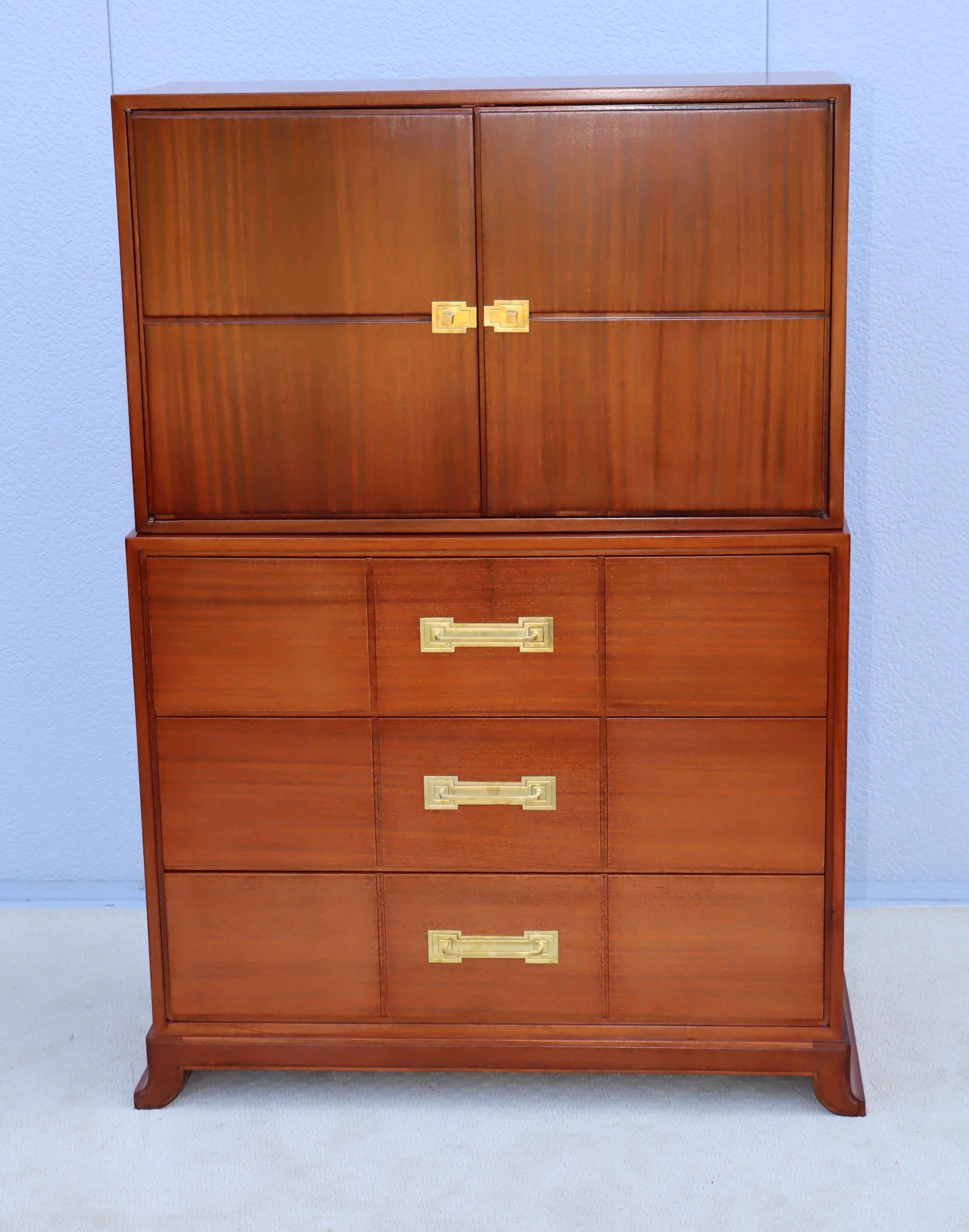 Amazing 1950's Tommi Parzinger designed for Charak Modern mahogany and brass tall chest of drawers, lightly restore keeping the beautiful original wood finish, the brass has been gently hand polished.