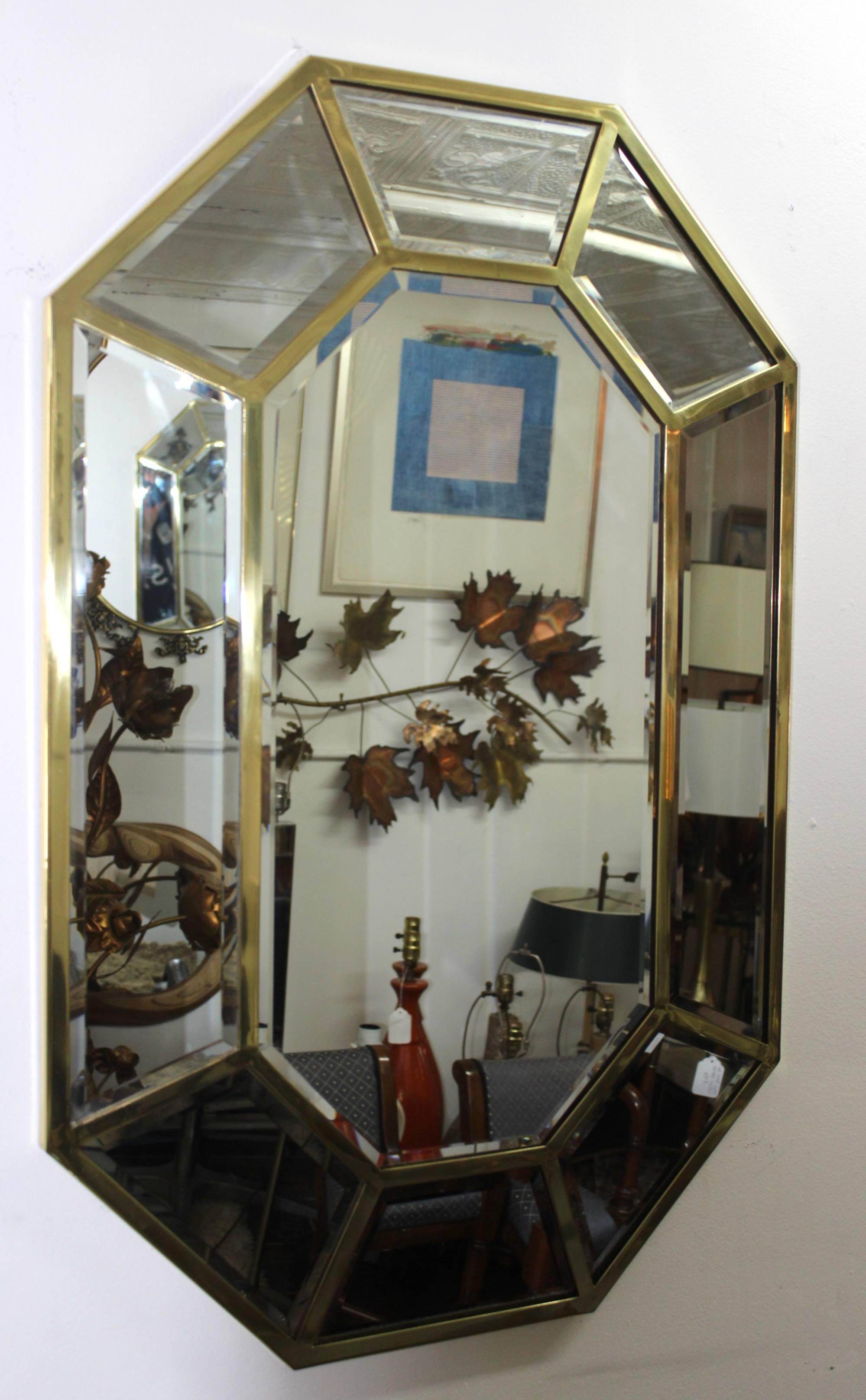 1970s modern octagonal brass mirror.