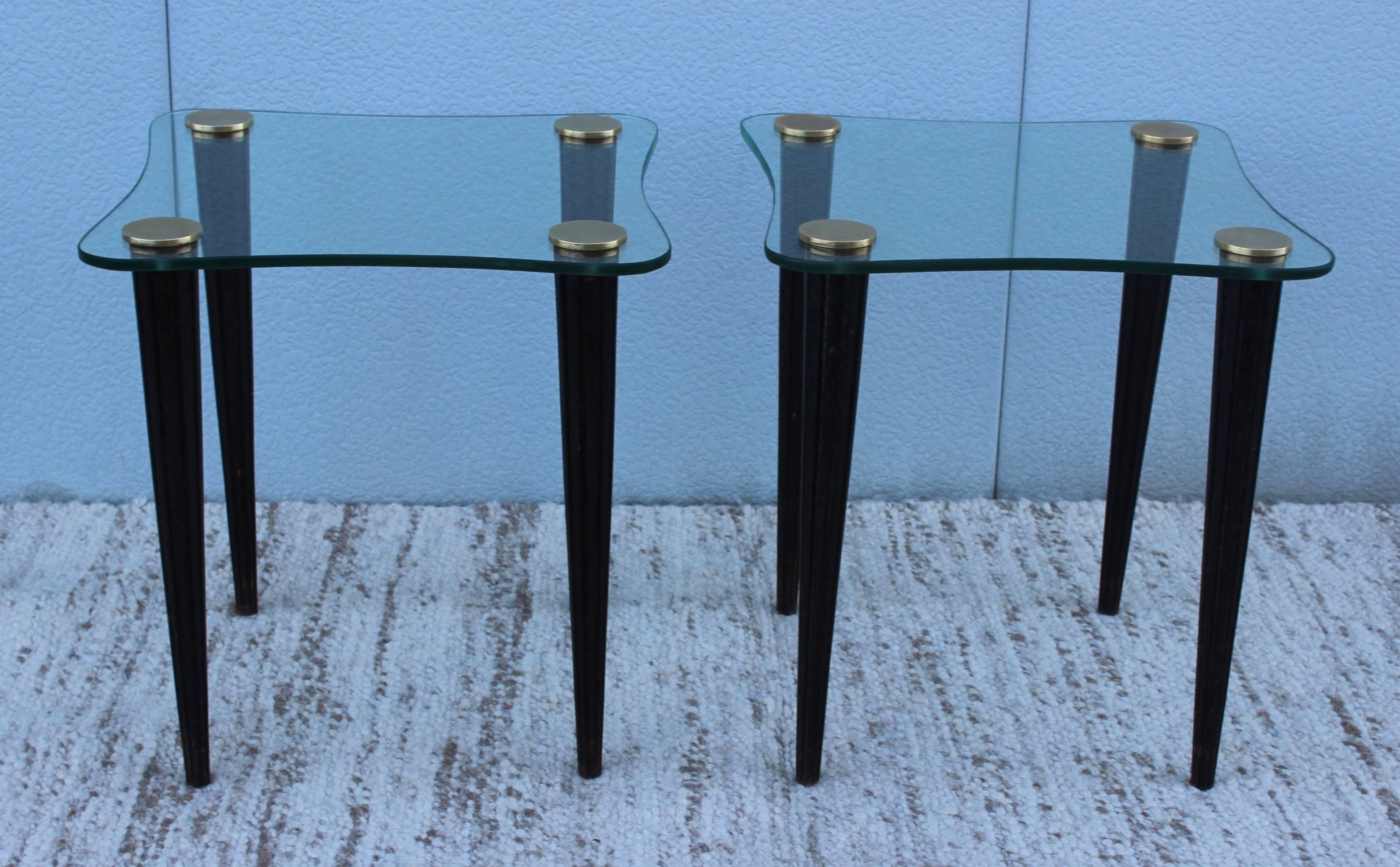 Stunning pair of 1950s Gilbert Rohde attributed "Cloud" side tables, with cerused legs and brass caps.