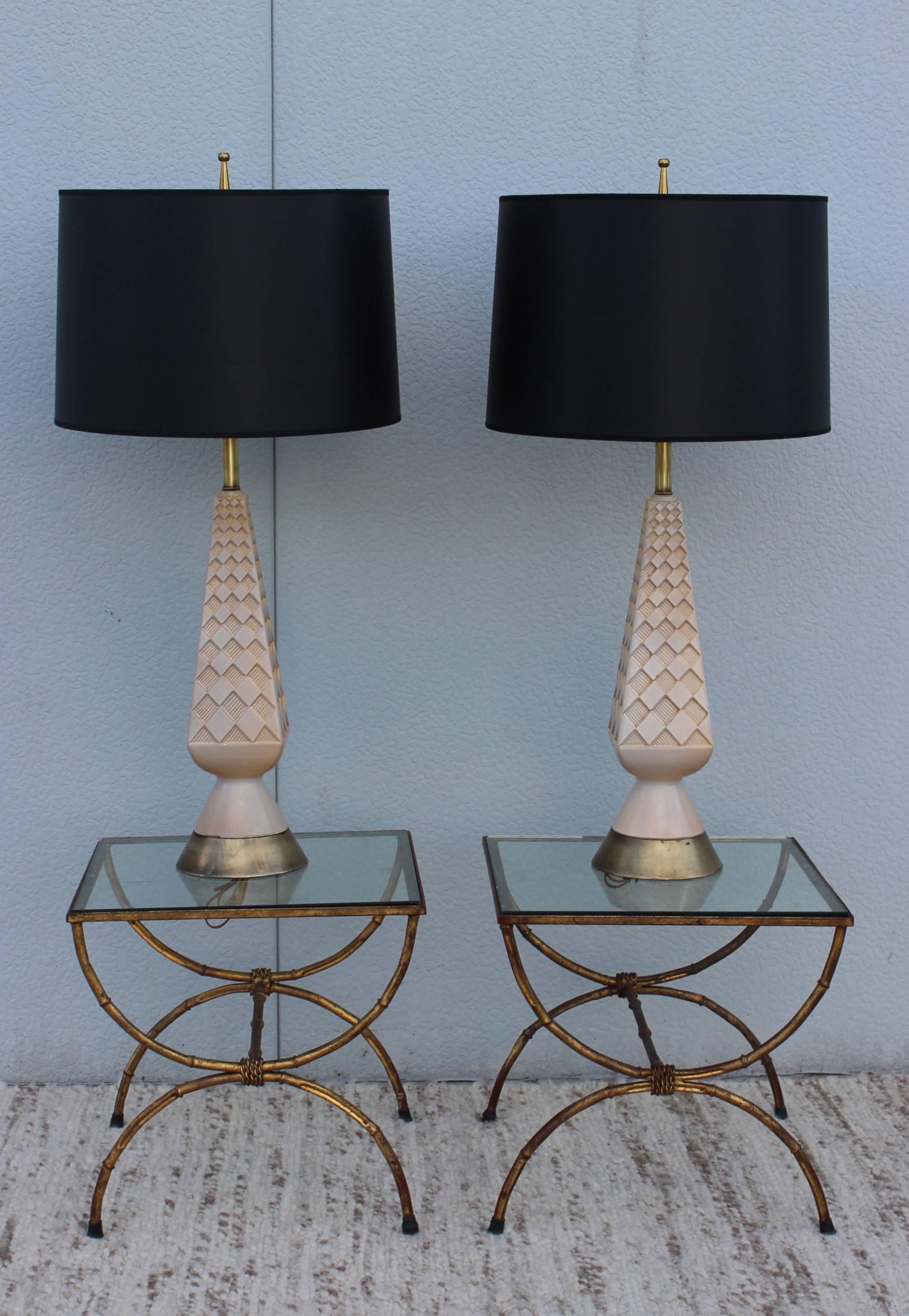 1950s Modern ceramic and brass table lamps. Newly rewired.

Shades for photography only.

Measures: Height to light socket 26''.