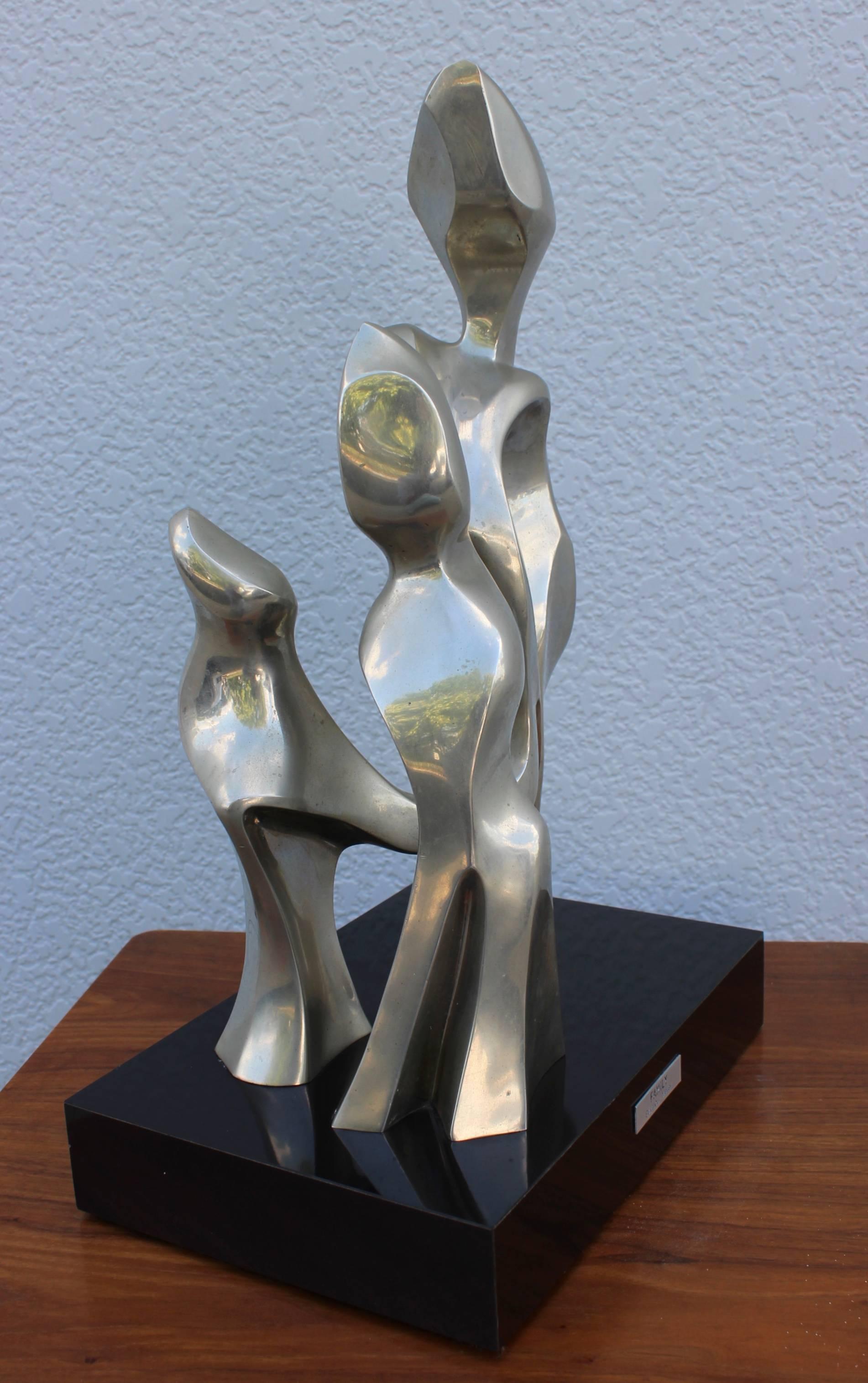 Stunning solid bronze sculpture by Seymour Meyer, mounted on a acrylic swivel base. Signed and number 1/9.
