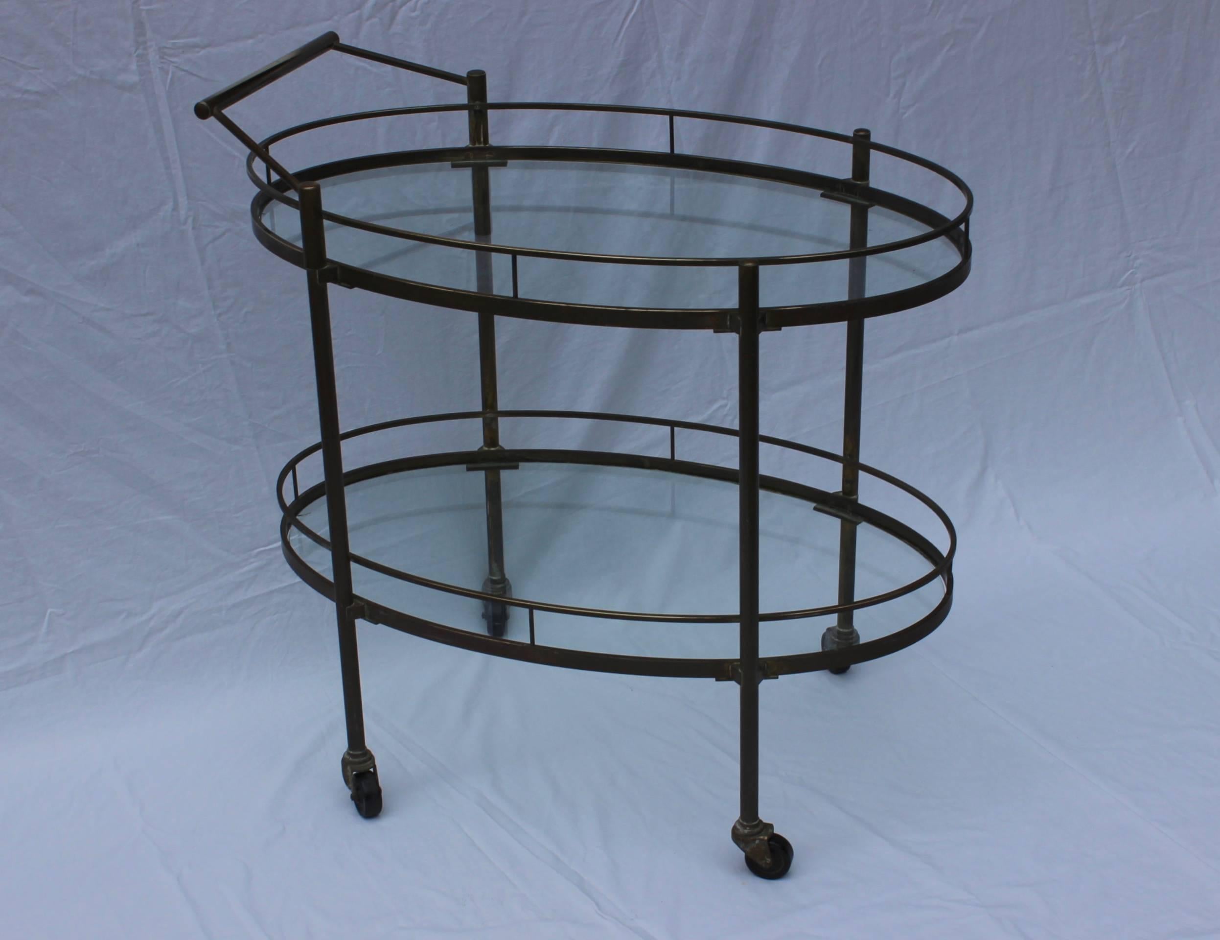 Stunning 1950s modern beautifully patinated solid brass bar cart. 

Height without the handle 27''.