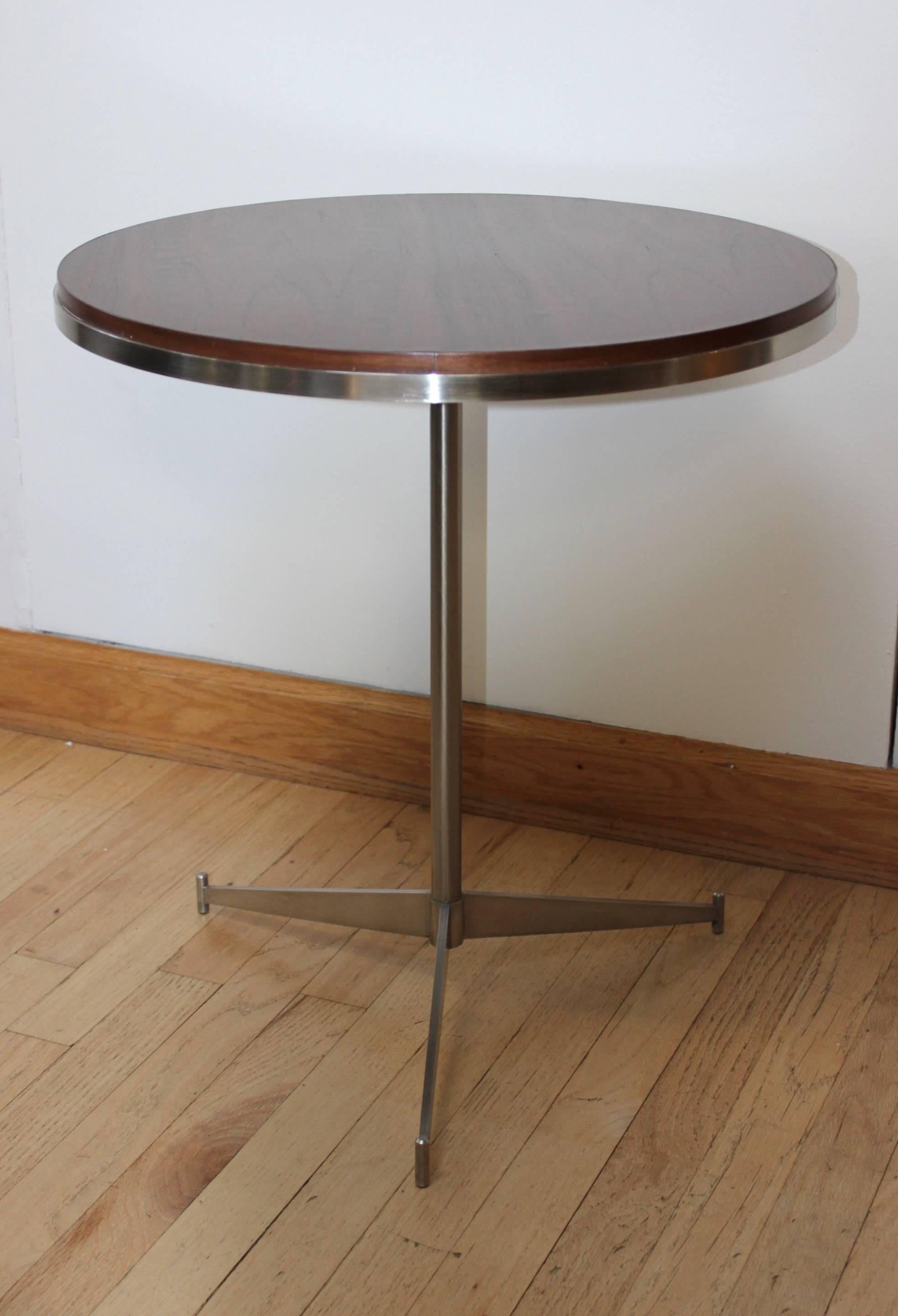 1970s modern tripod chrome and walnut side table in the style of Paul McCobb.