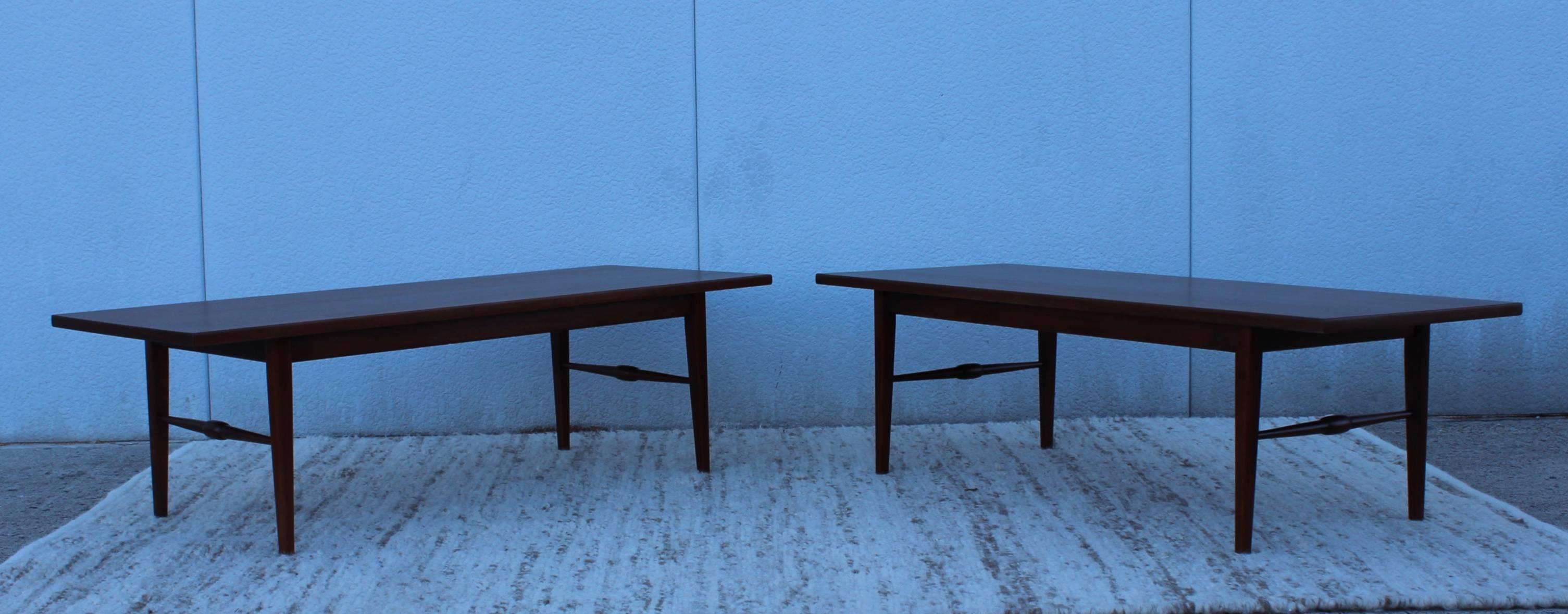 Stunning pair of 1960s walnut coffee tables they can also be use as benches.