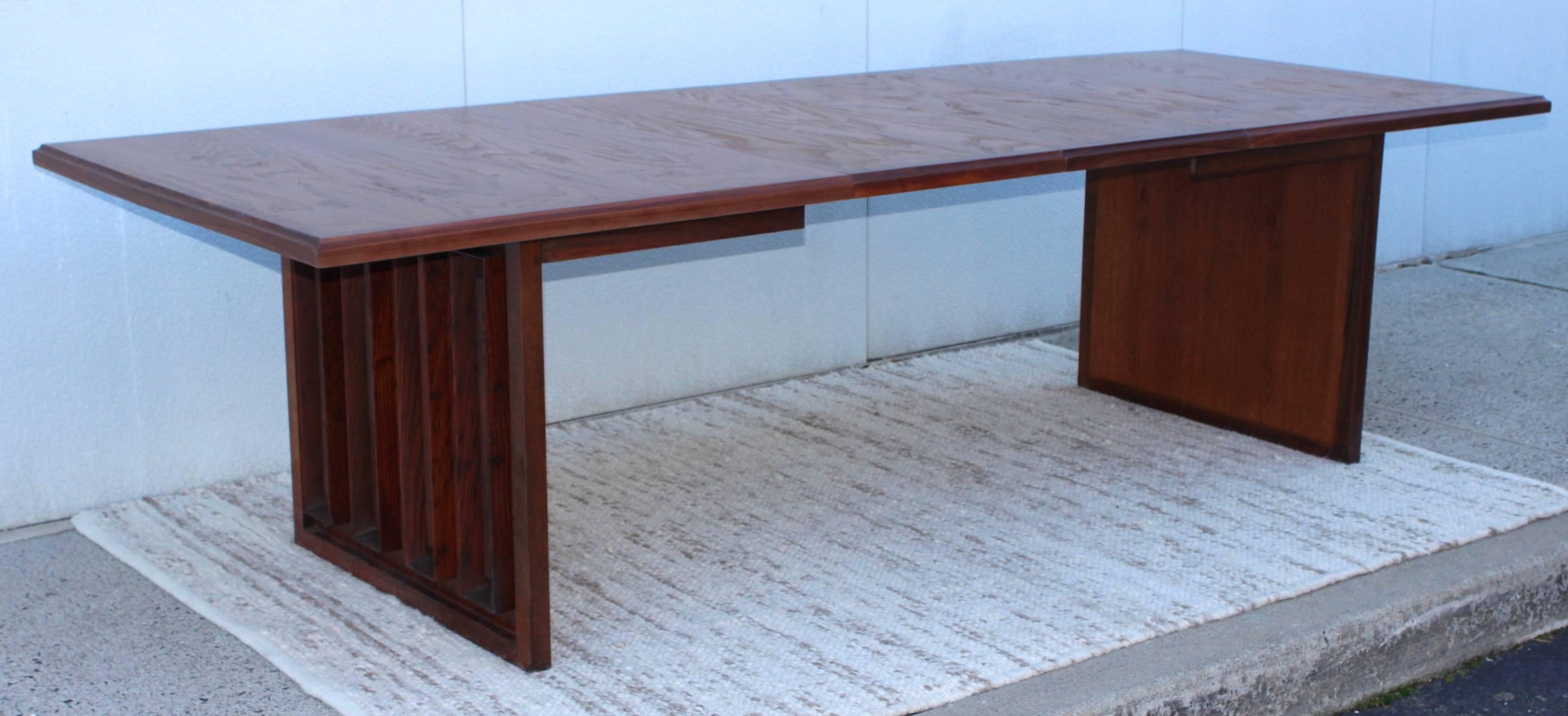 Stunning 1970s studio made oak and walnut distressed dining table, purchased in 1971 in New Hope Pennsylvania near the studios of Phillip Lloyd Powell and Paul Evans, beautiful craftsmanship and detail.

Length without the leaves 72''