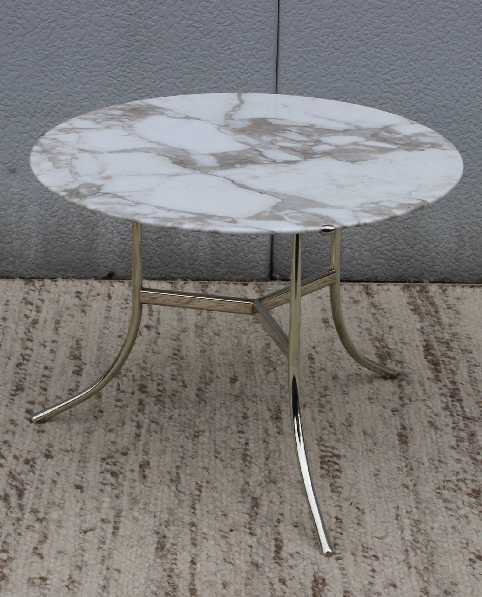 Very rare Cedric Hartman coffee table with Carrara marble top , there were only 3 of them made, signed and numbered ''4349'' the base is made of nickel silver alloy.