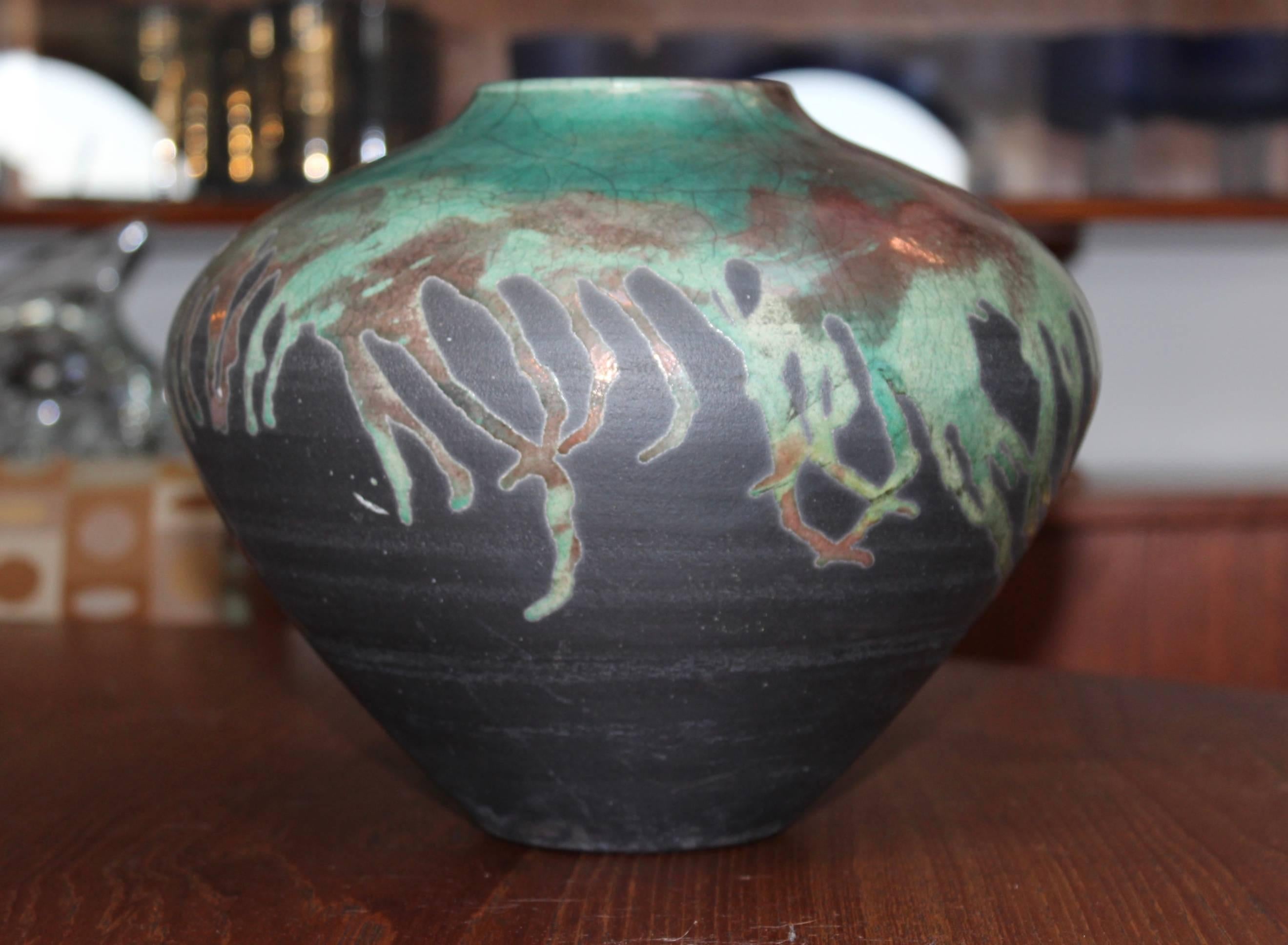 Stunning John Melkonian decorative Raku bowl.