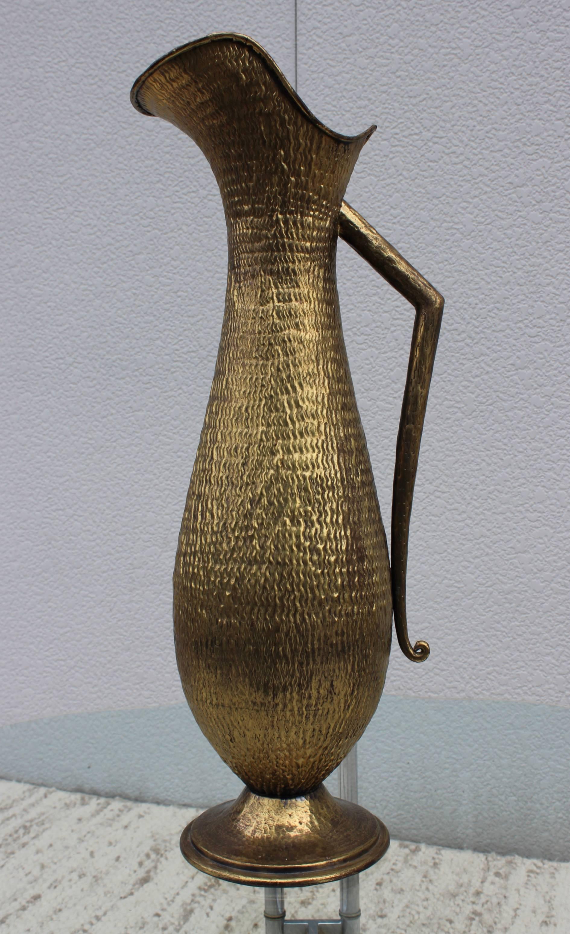 1960s tall hammered brass decorative Italian pitcher.