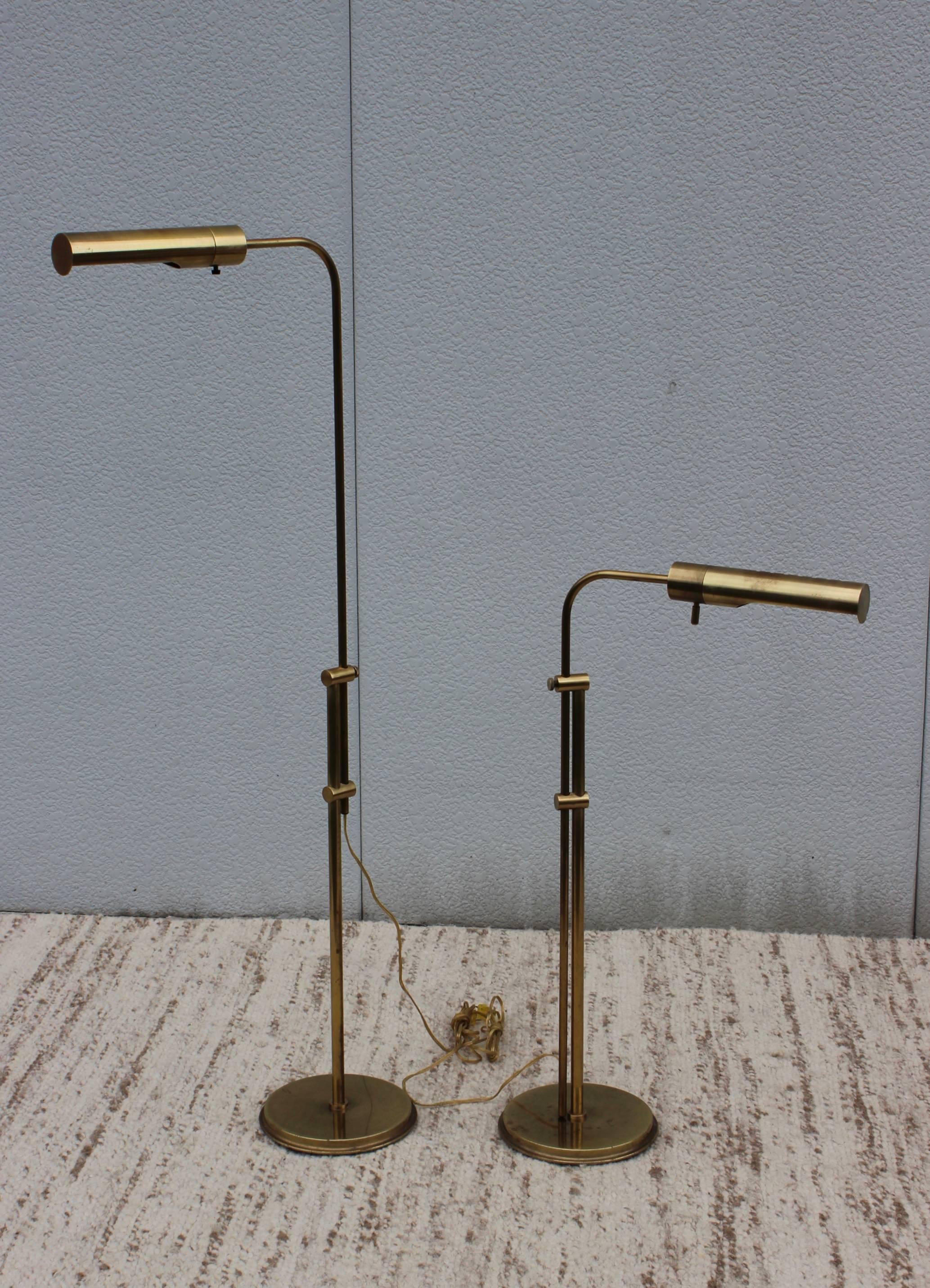 1970s adjustable height brass floor lamps by Frederick Cooper.