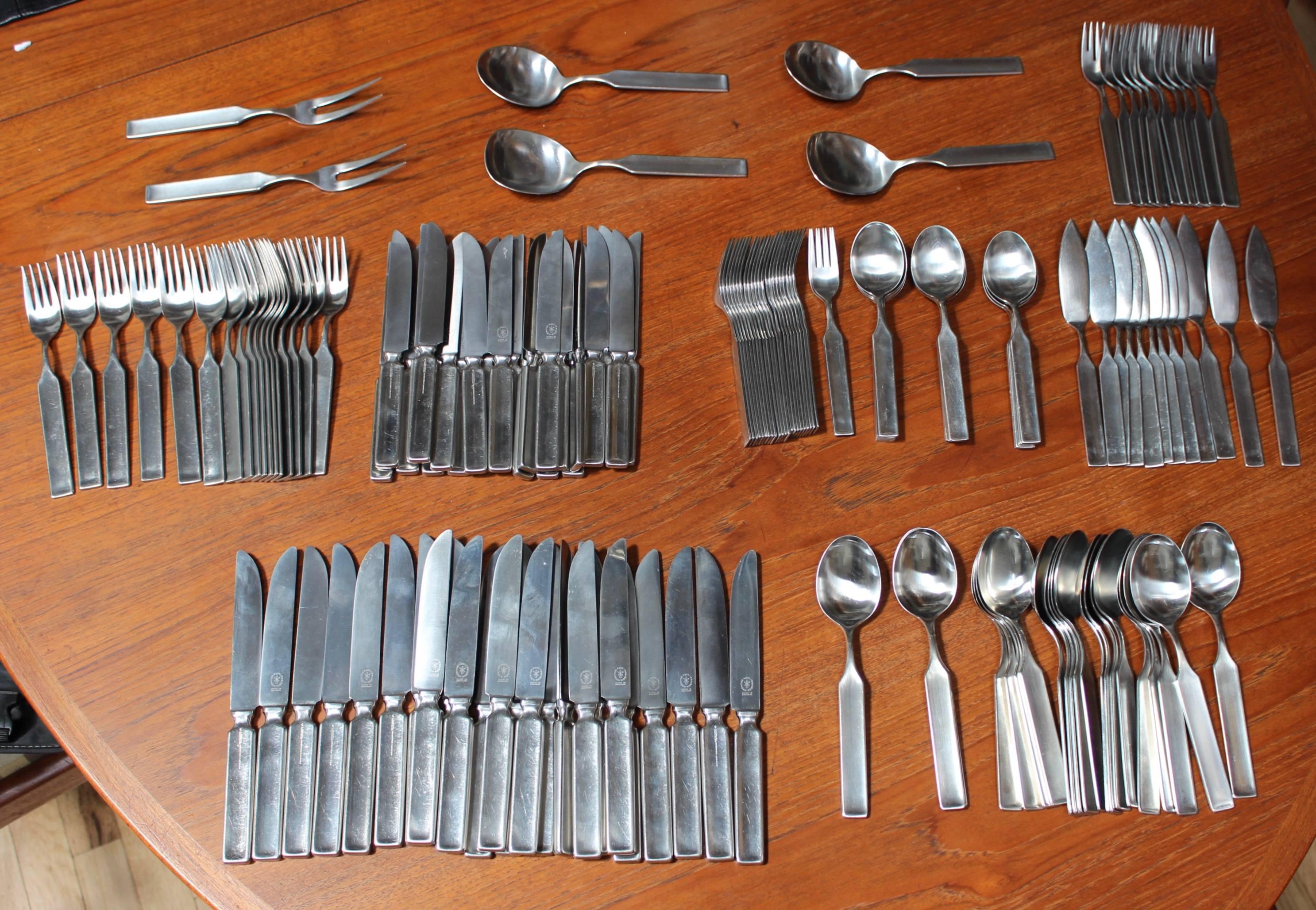 Stunning set of 1960s modern C. Hugo Pott No 2727 flatware. 8 place setting for twelve with six serving pieces plus 57 extra pieces 

Set includes: 
17 tea spoons
22 soup spoons
24 salad forks
17 dinner forks
22 salad knives
24 dinner