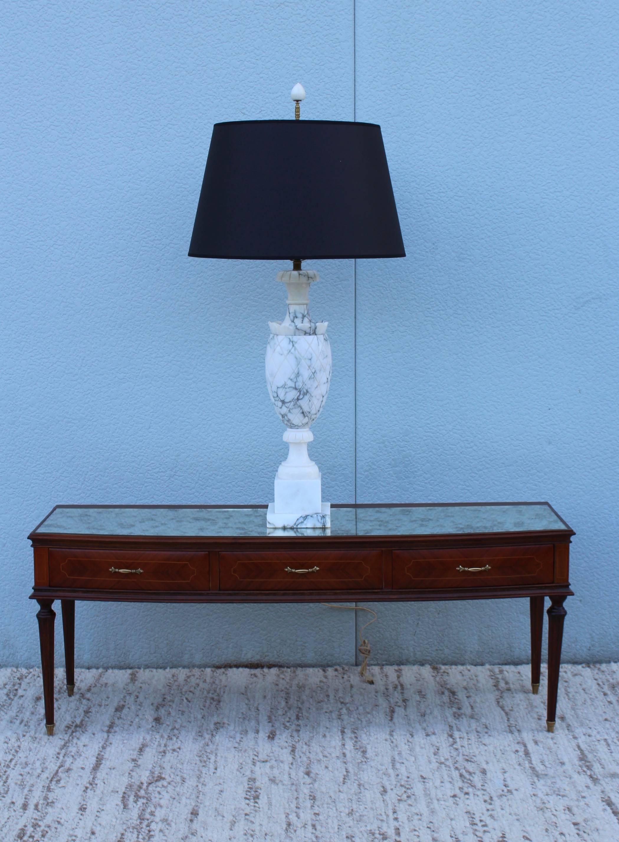 1960s carved marble tall Italian table lamp.

Measure: Height to light socket 27''

Shade for photography only.