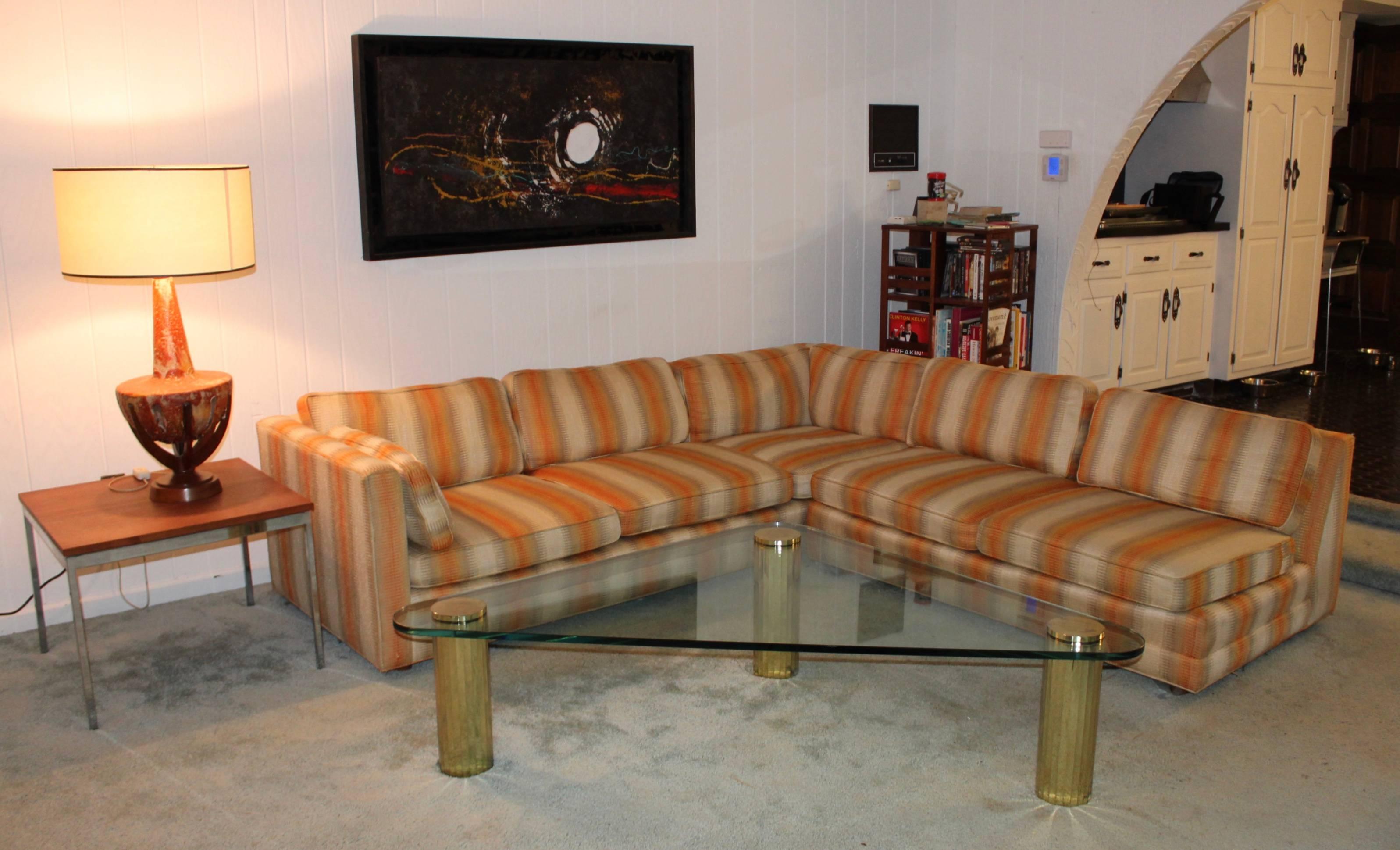 1970s two-piece sectional by Henredon. In original upholstery with walnut legs.